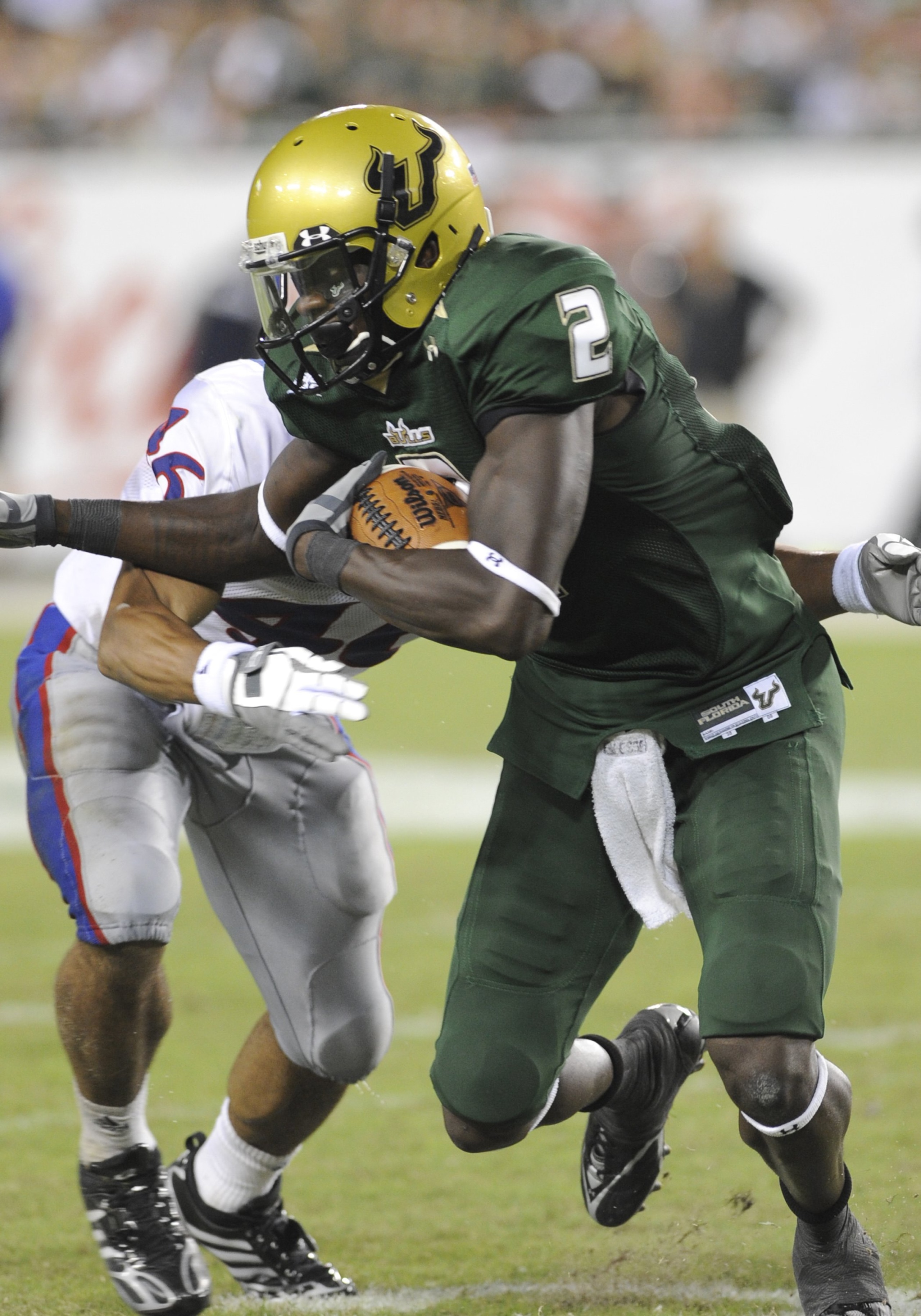 TAMPA, FL - SEPTEMBER 12: Wide receiver Carlton Mitchell #2 of the University of South Florida Bulls rushes upfield against the Kansas University Jayhawks at Raymond James Stadium on September 12, 2008 in Tampa, Florida. (Photo by Al Messerschmidt/Getty TAMPA, FL - SEPTEMBER 12: Wide receiver Carlton Mitchell #2 of the University of South Florida Bulls rushes upfield against the Kansas University Jayhawks at Raymond James Stadium on September 12, 2008 in Tampa, Florida. (Photo by Al Messerschmidt/Getty