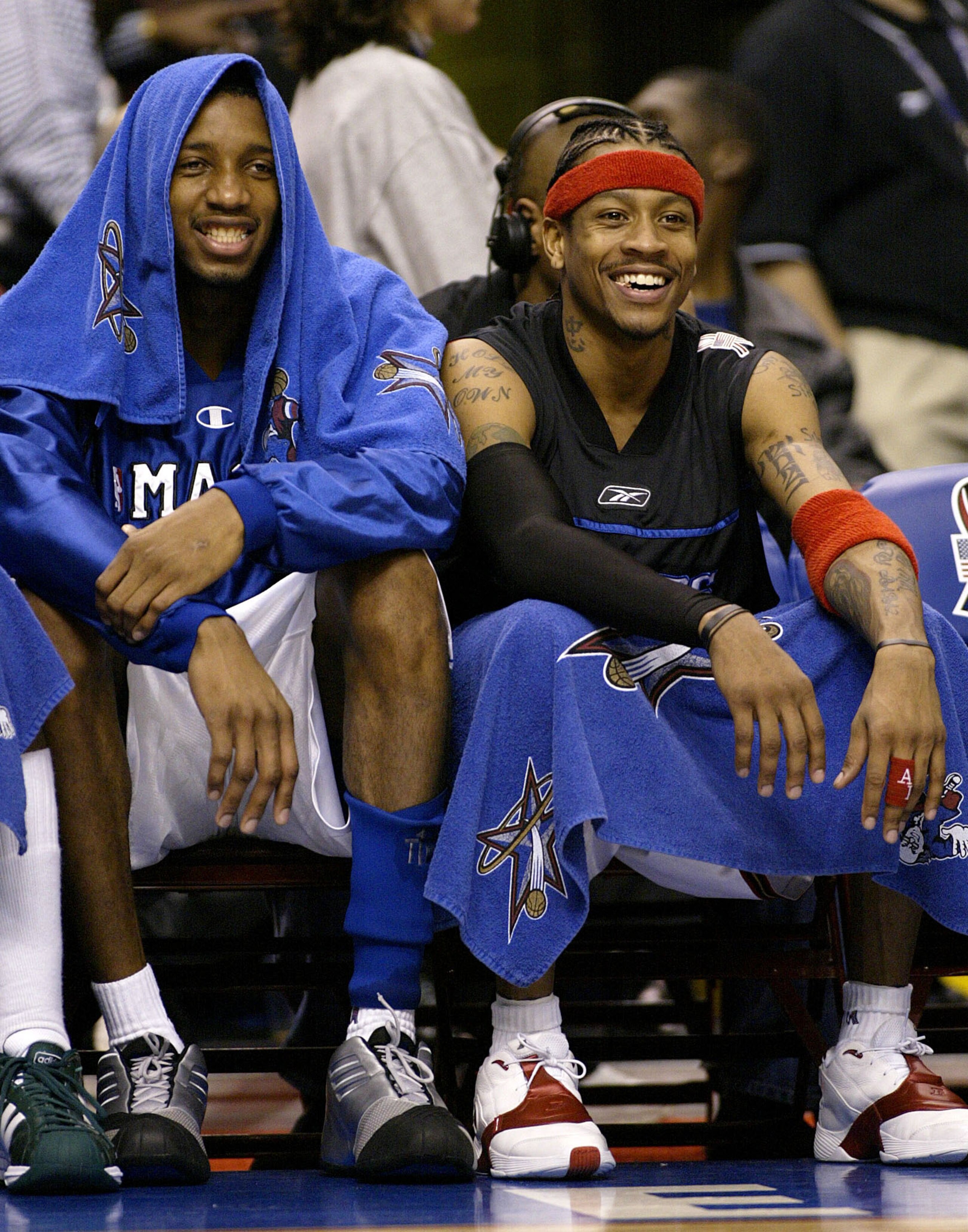 10 Feb 2002:  Tracy McGrady #1 of the Orlando Magic and Allen Iverson #3 of the Philadelphia 76''ers and the Eastern Conference team share a laugh on the bench  during the NBA All-Star game at the First Union Center in Philadelphia, Pennsylvania.    The W