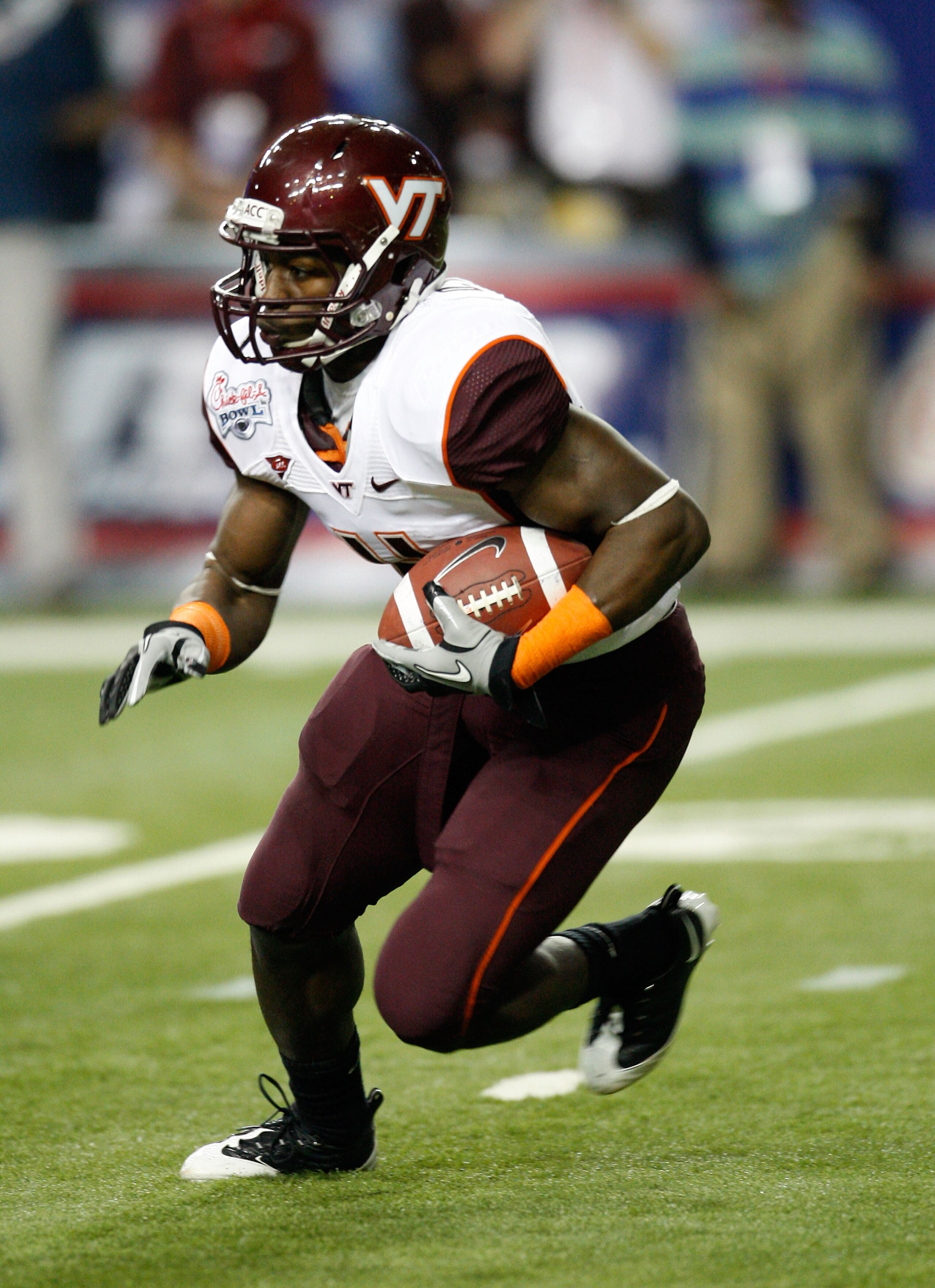ATLANTA - DECEMBER 31:  Running back David Wilson #4 of the Virginia Tech Hokies runs with the ball during the Chick-Fil-A Bowl against the Tennessee Volunteers at the Georgia Dome on December 31, 2009 in Atlanta, Georgia.  The Hokies beat the Volunteers 