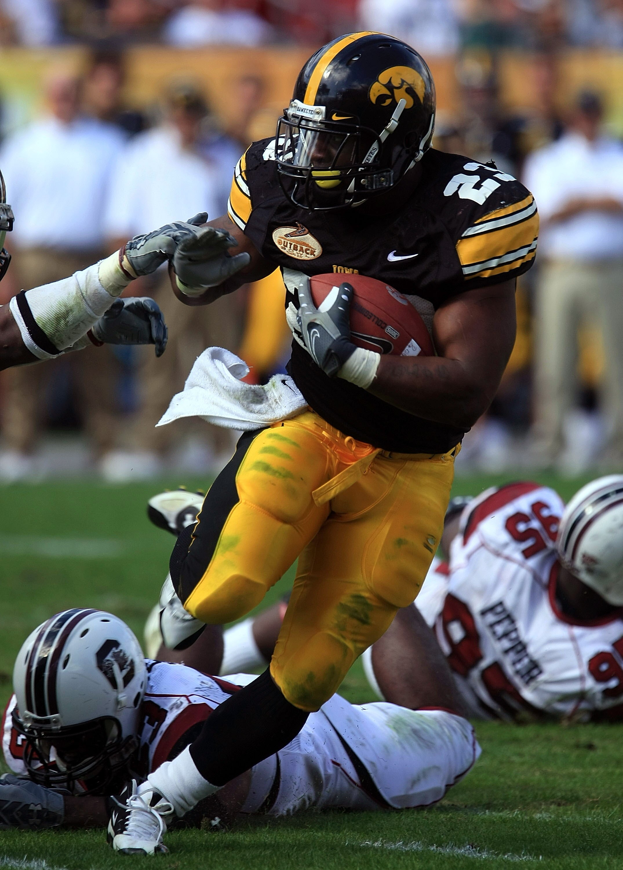 TAMPA, FL - JANUARY 01:  Shonn Green #23 of the Iowa Hawkeyes runs the ball against the South Carolina Gamecocks during the Outback Bowl on January 1, 2009 at Raymond James Stadium in Tampa, Florida.  (Photo by Scott Halleran/Getty Images)