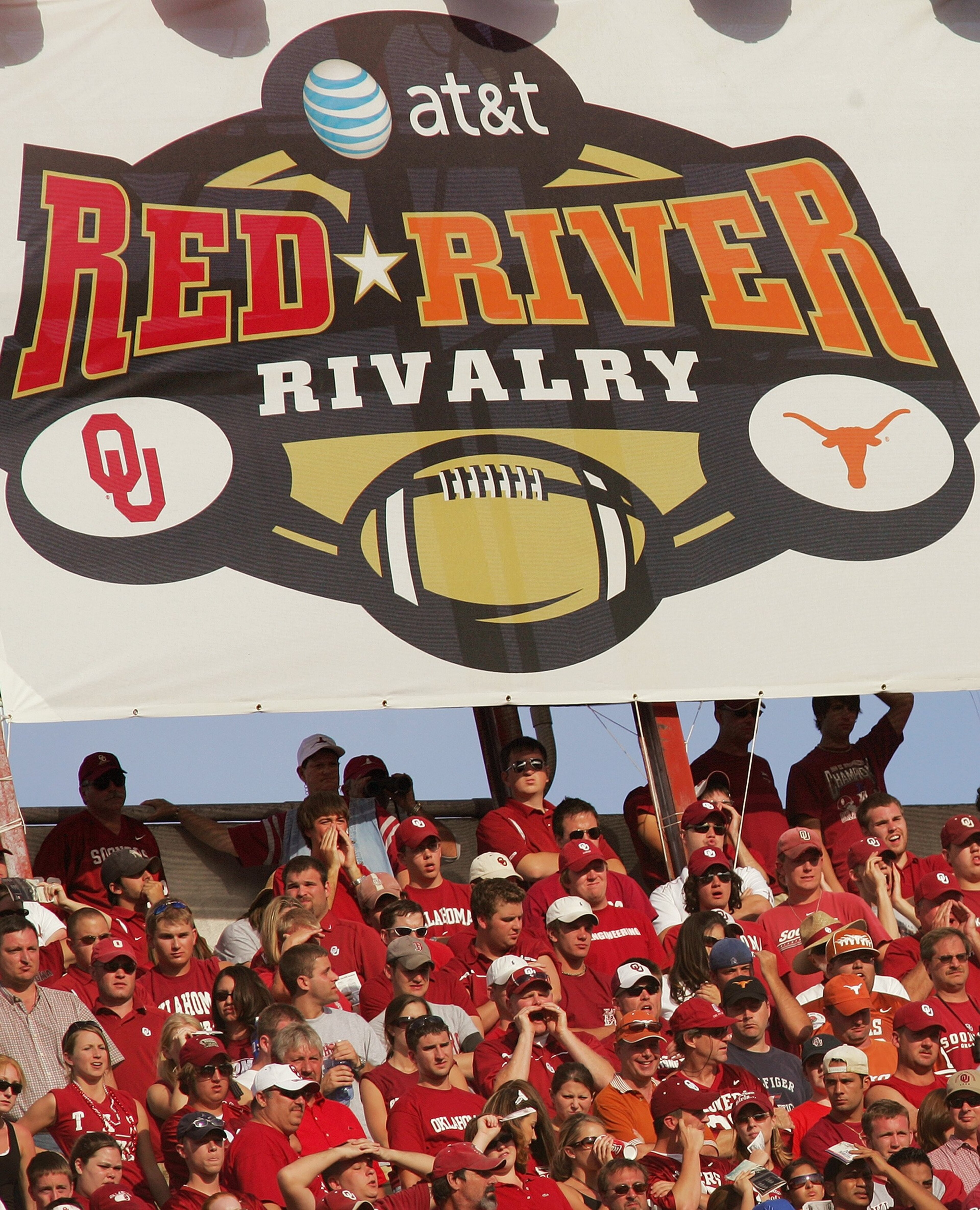 DALLAS - OCTOBER 7: General view of the Rivalry banner hung above fans during the Red River Shootout between the Texas Longhorns and the Oklahoma Sooners at the Cotton Bowl on October 7, 2006 in Dallas, Texas. The Longhorns won 28-10. (Photo by Ronald Ma DALLAS - OCTOBER 7: General view of the Rivalry banner hung above fans during the Red River Shootout between the Texas Longhorns and the Oklahoma Sooners at the Cotton Bowl on October 7, 2006 in Dallas, Texas. The Longhorns won 28-10. (Photo by Ronald Ma