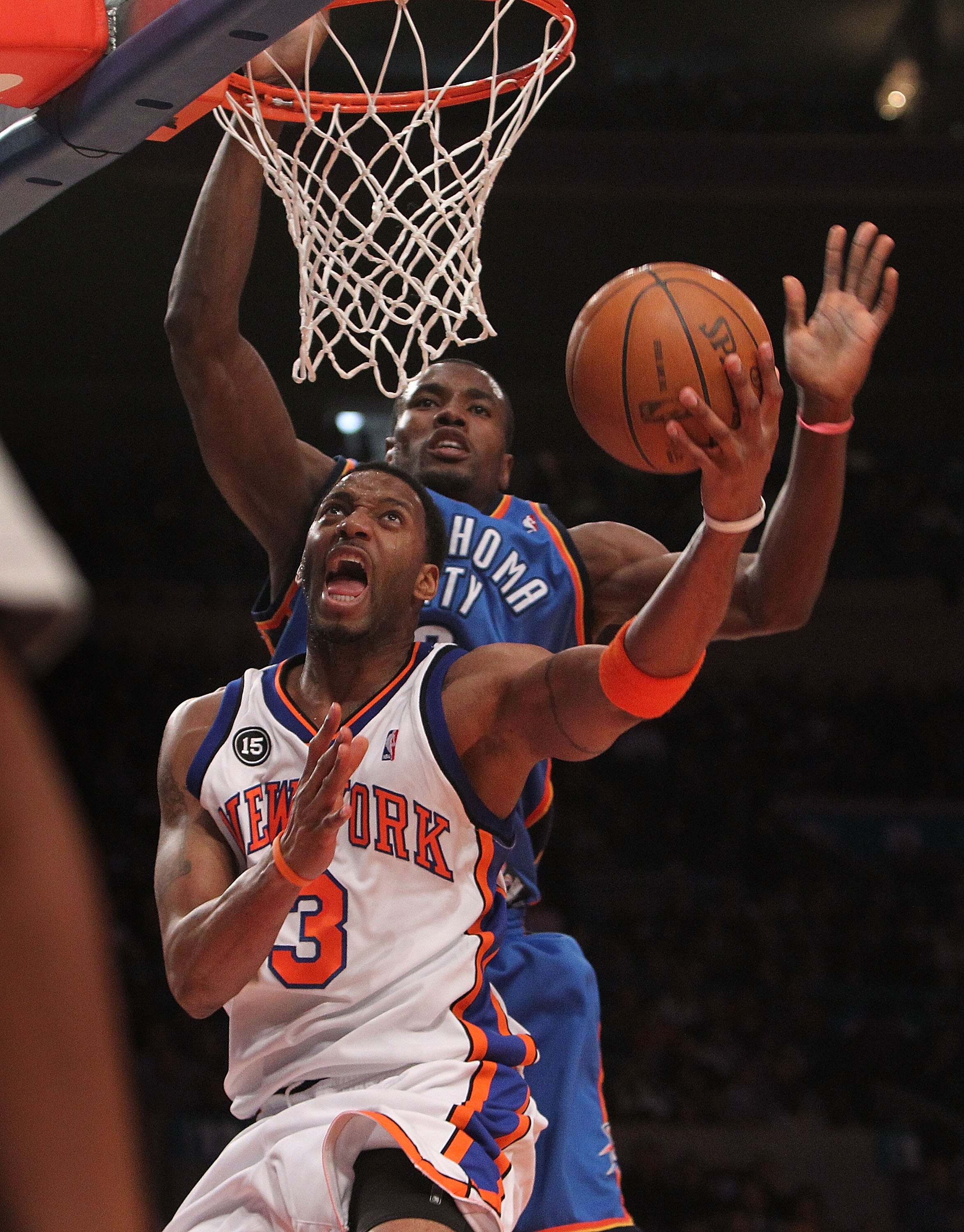 NEW YORK - FEBRUARY 20:  Tracy McGrady #3 of the New York Knicks lays the ball up under pressure from Serge Ibaka #9 of the Oklahoma City Thunder at Madison Square Garden on February 20, 2010 in New York, New York. NOTE TO USER: User expressly acknowledge