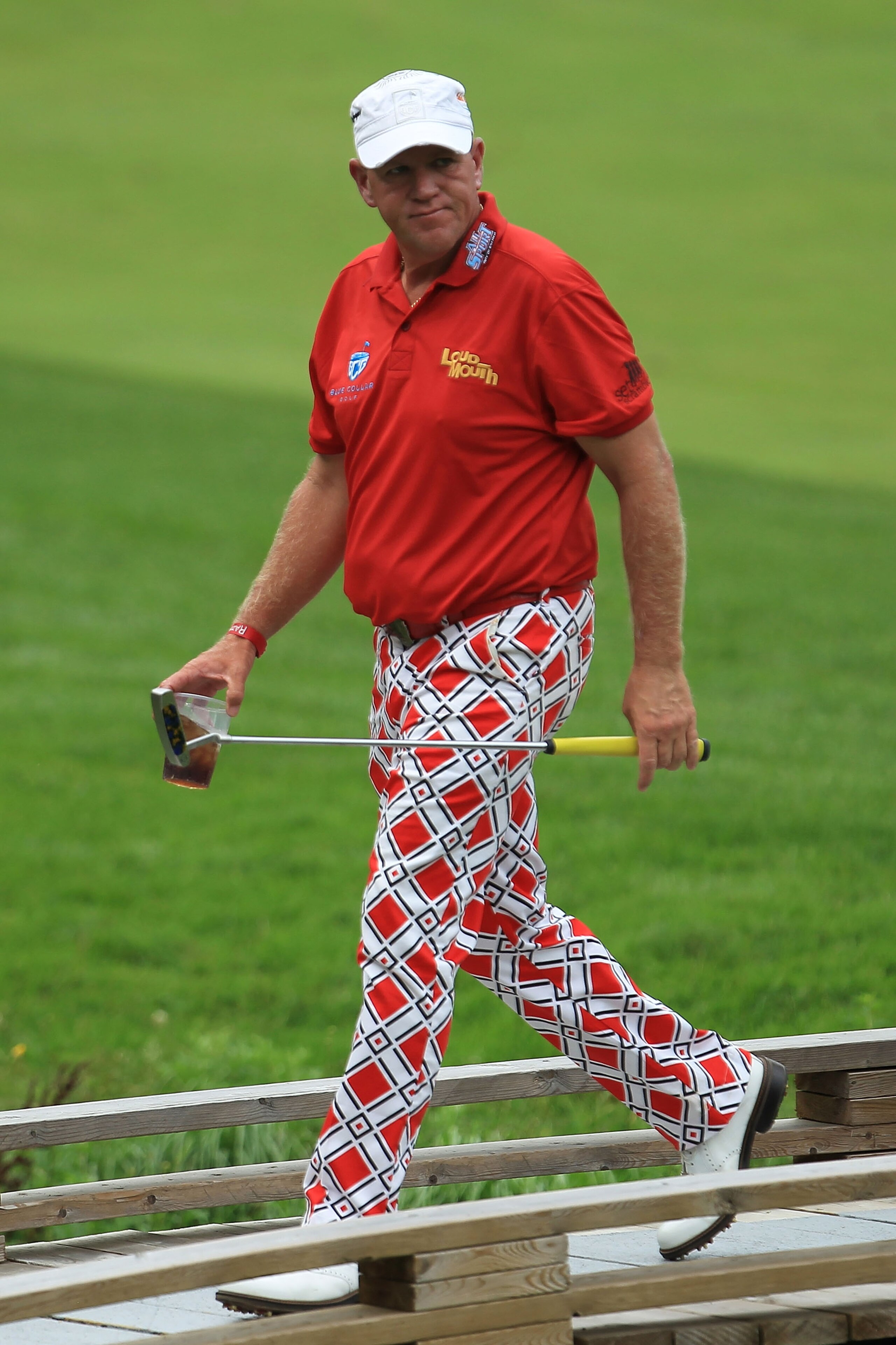 ETOBICOKE, ON - JULY 22:  John Daly walks to the green on the 14th hole during round one of the 2010 RBC Canadian Open at St. George's Golf and Country Club on July 22, 2010 in Etobicoke, Canada.  (Photo by Chris McGrath/Getty Images)