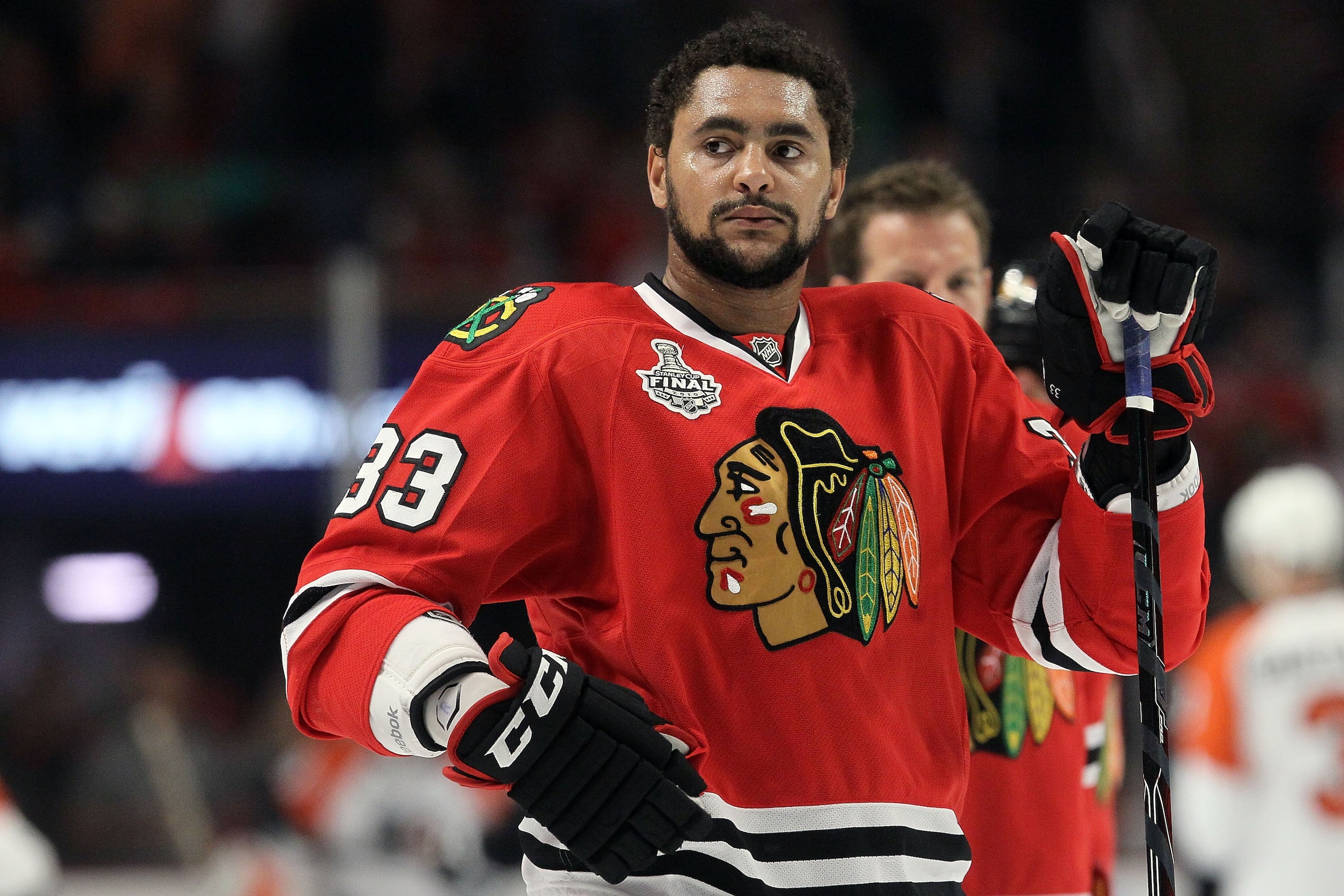 CHICAGO - MAY 31:  Dustin Byfuglien #33 of the Chicago Blackhawks looks on while taking on the Philadelphia Flyers in Game Two of the 2010 NHL Stanley Cup Final at the United Center on May 31, 2010 in Chicago, Illinois.  (Photo by Jim McIsaac/Getty Images
