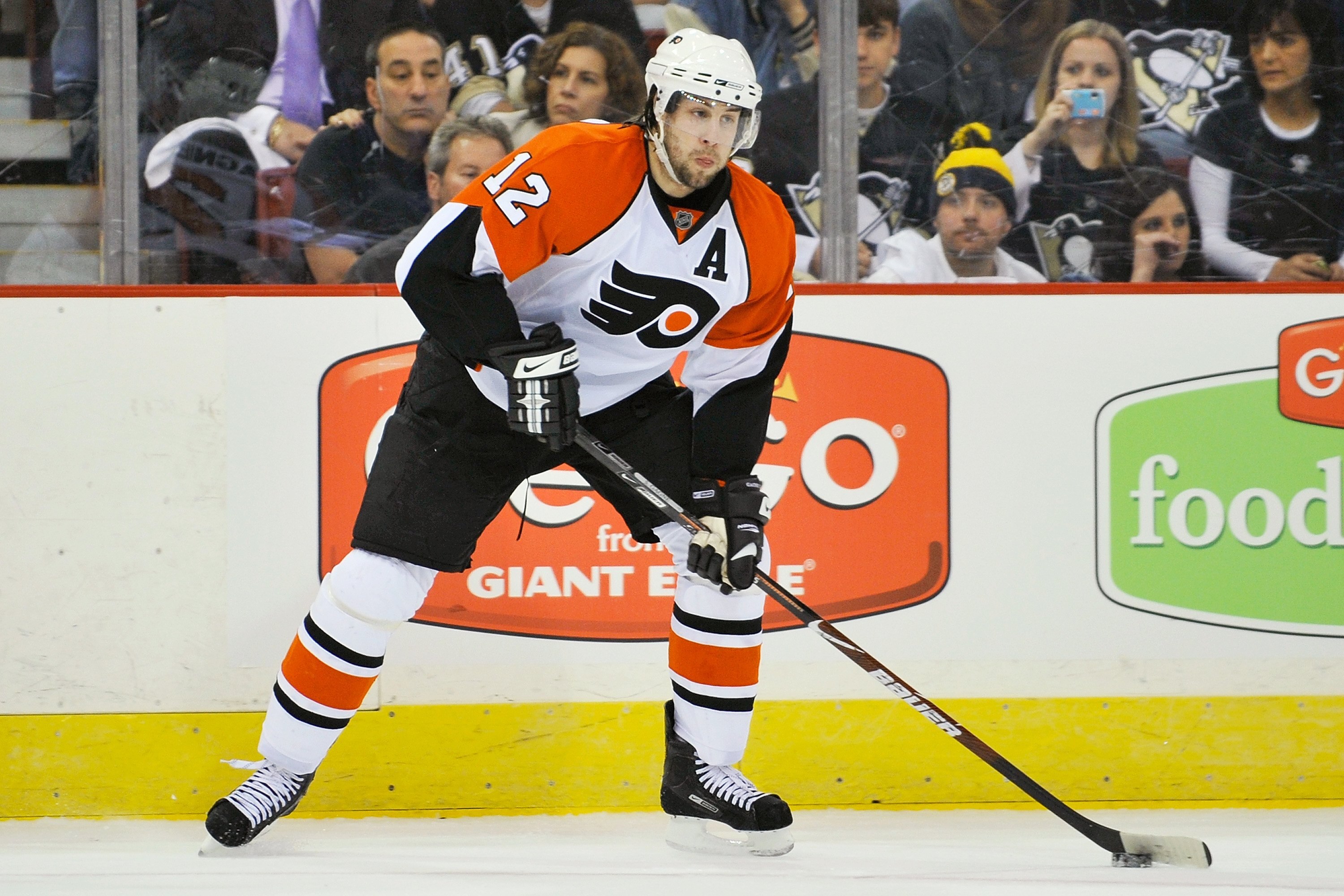 PITTSBURGH - APRIL 17:  Forward Simon Gagne #12 of the Philadelphia Flyers skates with the puck against the Pittsburgh Penguins during Game Two of the Eastern Conference Quarterfinals of the 2009 Stanley Cup Playoffs on April 17, 2009 at Mellon Arena in P