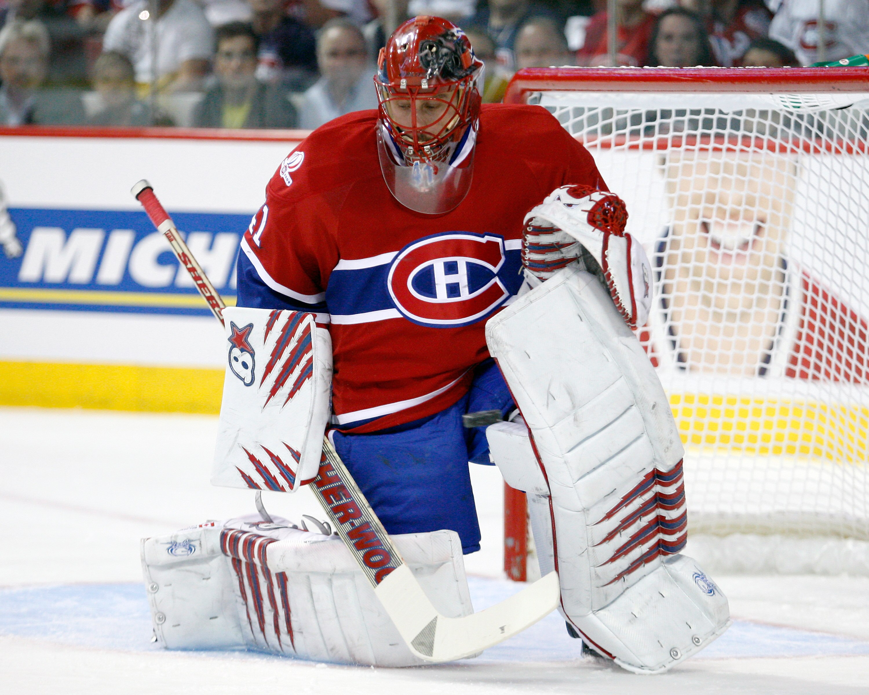 MONTREAL- MAY 4:  Jaroslav Halak #41 of the Montreal Canadiens gets down to stop the puck in Game Three of the Eastern Conference Semifinals against the Pittsburgh Penguins during the 2010 NHL Stanley Cup Playoffs at the Bell Centre on May 4, 2010 in Mont