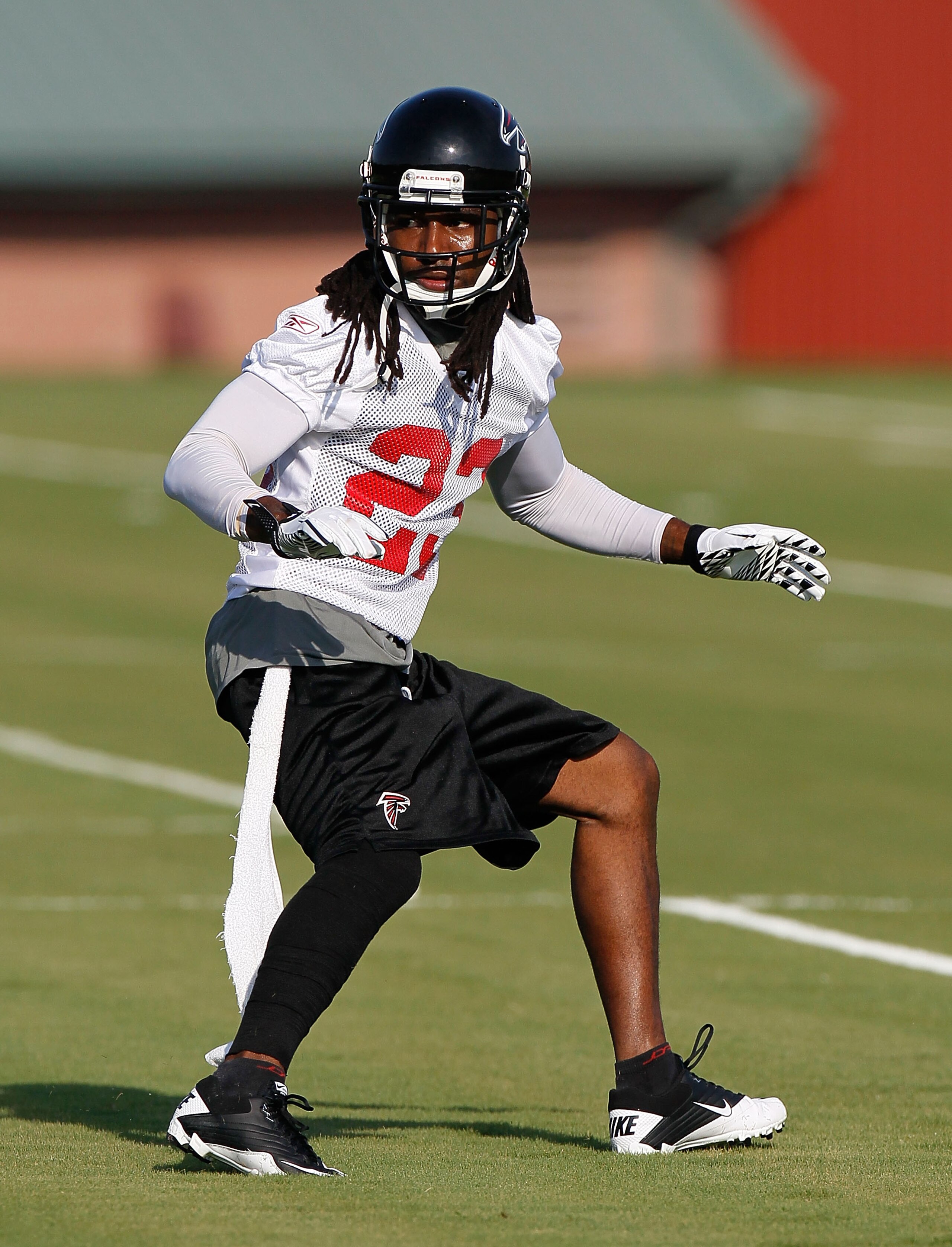 FLOWERY BRANCH, GA - JULY 30:  Dunta Robinson #23 of the Atlanta Falcons runs drills during opening day of training camp on July 30, 2010 at the Falcons Training Complex in Flowery Branch, Georgia.  (Photo by Kevin C. Cox/Getty Images)