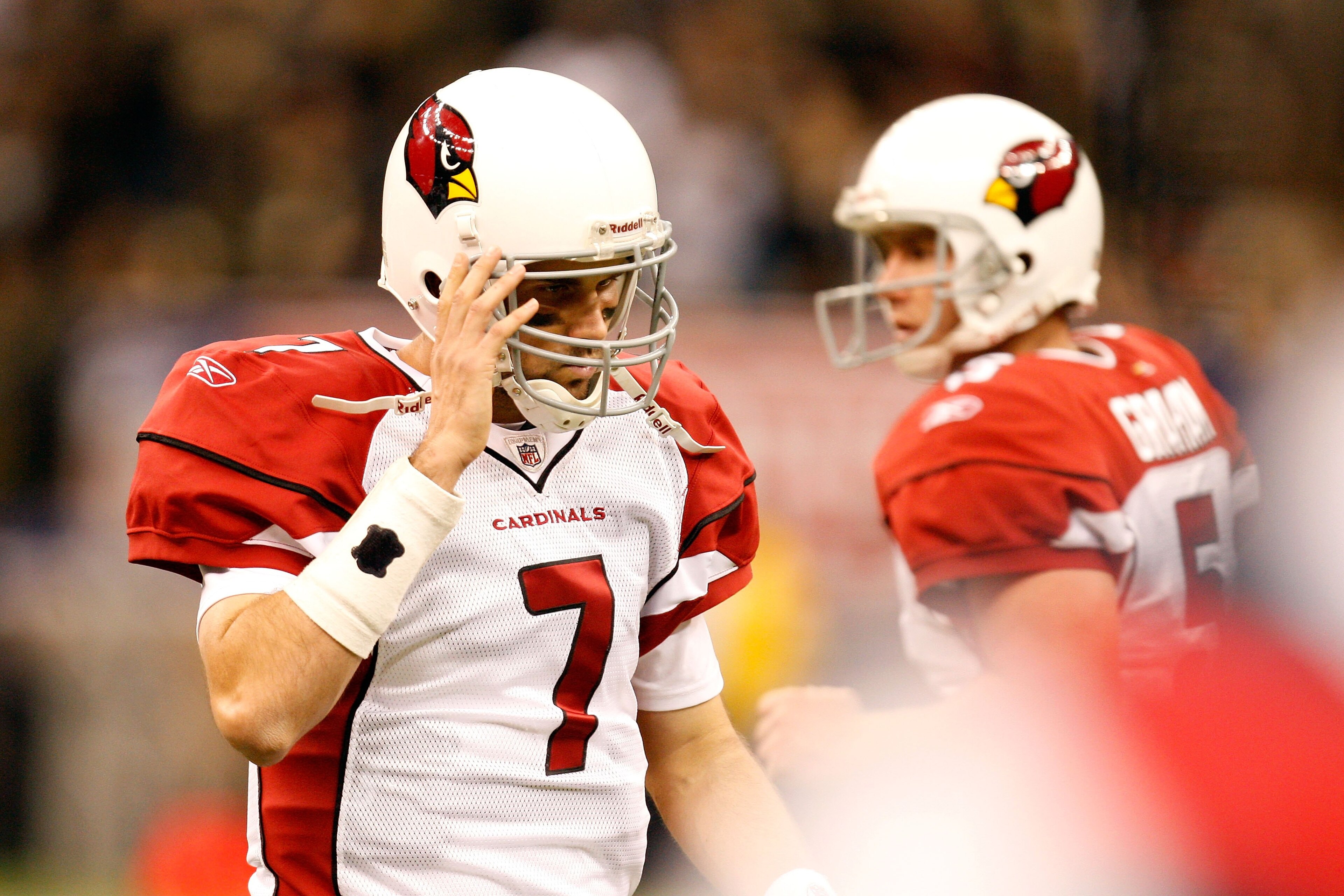 NEW ORLEANS - JANUARY 16:  Quarterback Matt Leinart #7 of the Arizona Cardinals walks back to the sideline against the New Orleans Saints during the NFC Divisional Playoff Game at Louisana Superdome on January 16, 2010 in New Orleans, Louisiana.  (Photo b