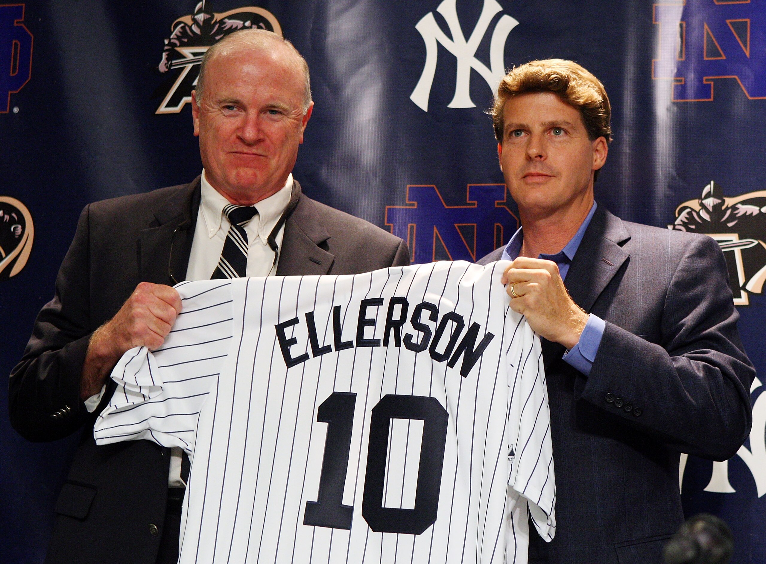 NEW YORK - JULY 20:  Army head coach Rich Ellerson and New York Yankees Managing General Partner Hal Steinbrenner pose for a photograph during a press conference announcing that Yankee Stadium will play host to the 2010 Notre Dame v Army college football