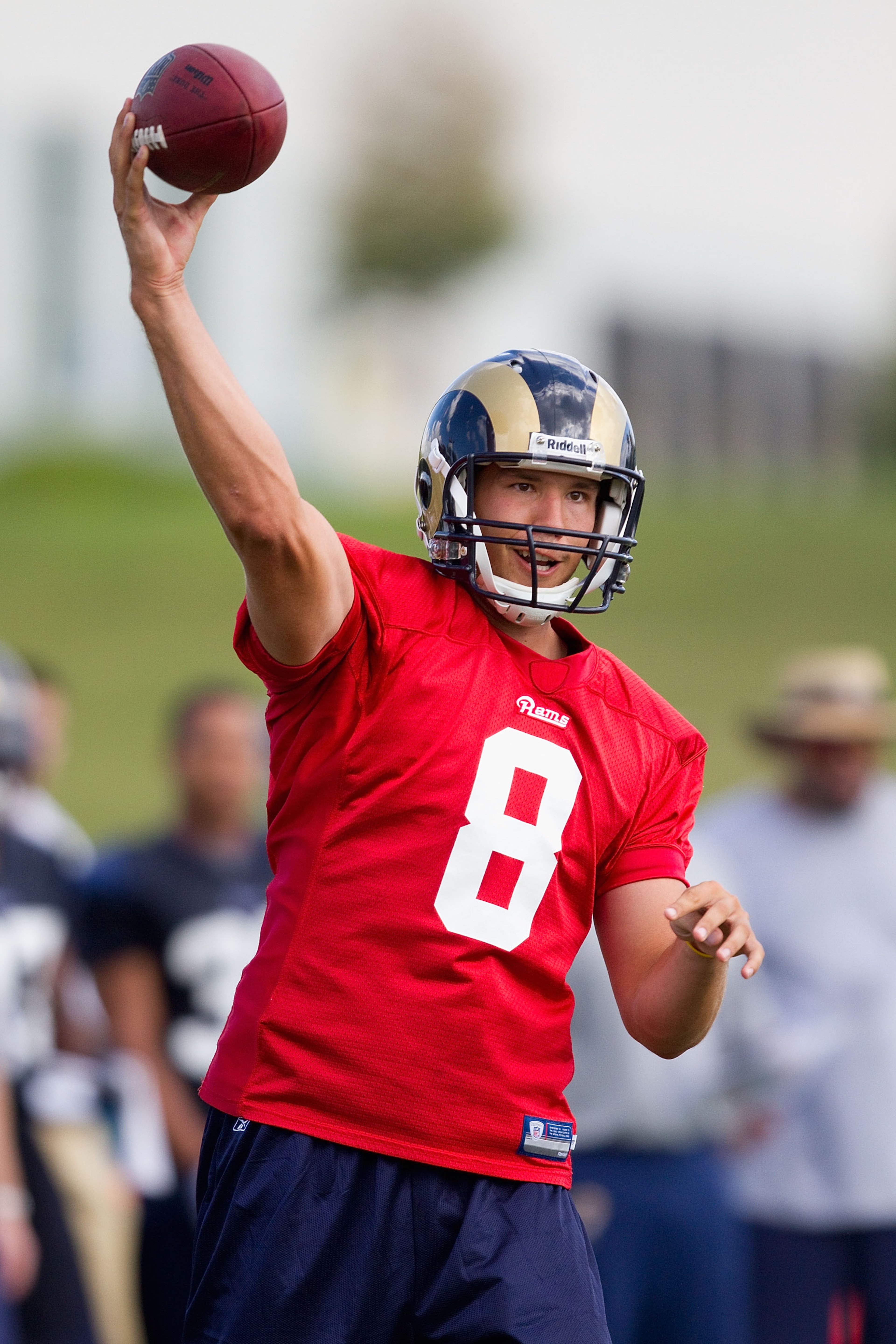 EARTH CITY, MO - JULY 31: Sam Bradford #8 of the St. Louis Rams passes during training camp at the Russell Athletic Training Facility on July 31, 2010 in Earth City, Missouri.  (Photo by Dilip Vishwanat/Getty Images)