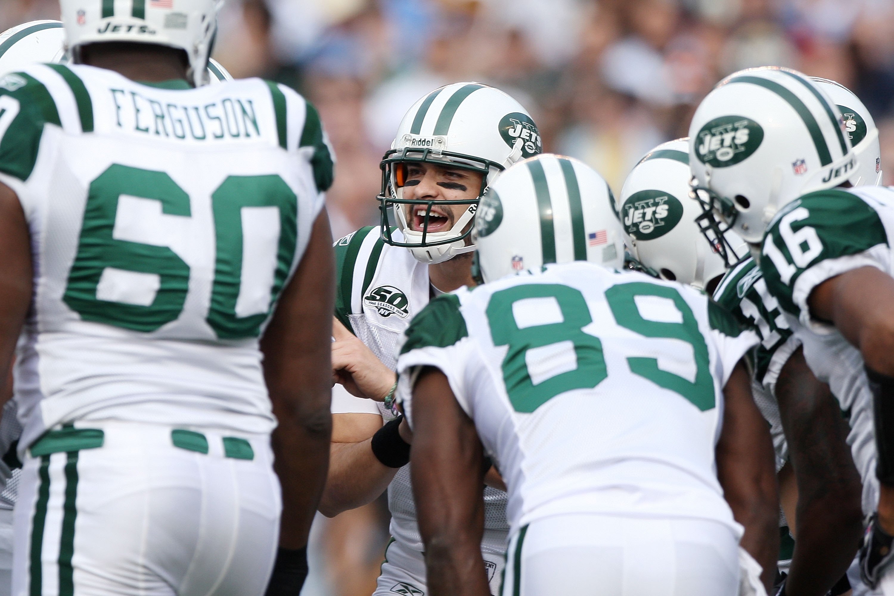 SAN DIEGO - JANUARY 17:  Quarterback Mark Sanchez #6 of the New York Jets calls a play in the huddle during the AFC Divisional Playoff Game against the New York Jets at Qualcomm Stadium on January 17, 2010 in San Diego, California.  (Photo by Donald Miral
