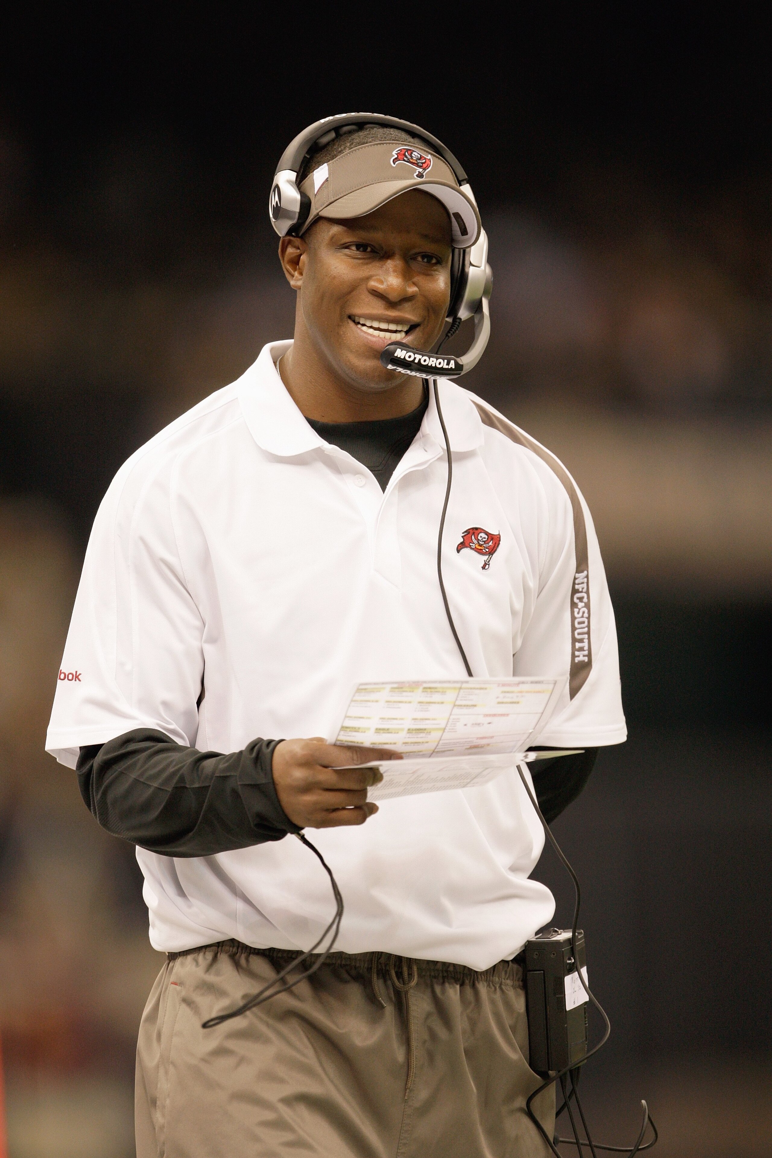 NEW ORLEANS - DECEMBER 27: Head coach Raheem Morris of the Tampa Bay Buccaneers walks on the sidelines during the game against the New Orleans Saints at the Louisiana Superdome on December 27, 2009 in New Orleans, Louisiana. (Photo by Jamie Squire/Getty NEW ORLEANS - DECEMBER 27: Head coach Raheem Morris of the Tampa Bay Buccaneers walks on the sidelines during the game against the New Orleans Saints at the Louisiana Superdome on December 27, 2009 in New Orleans, Louisiana. (Photo by Jamie Squire/Getty