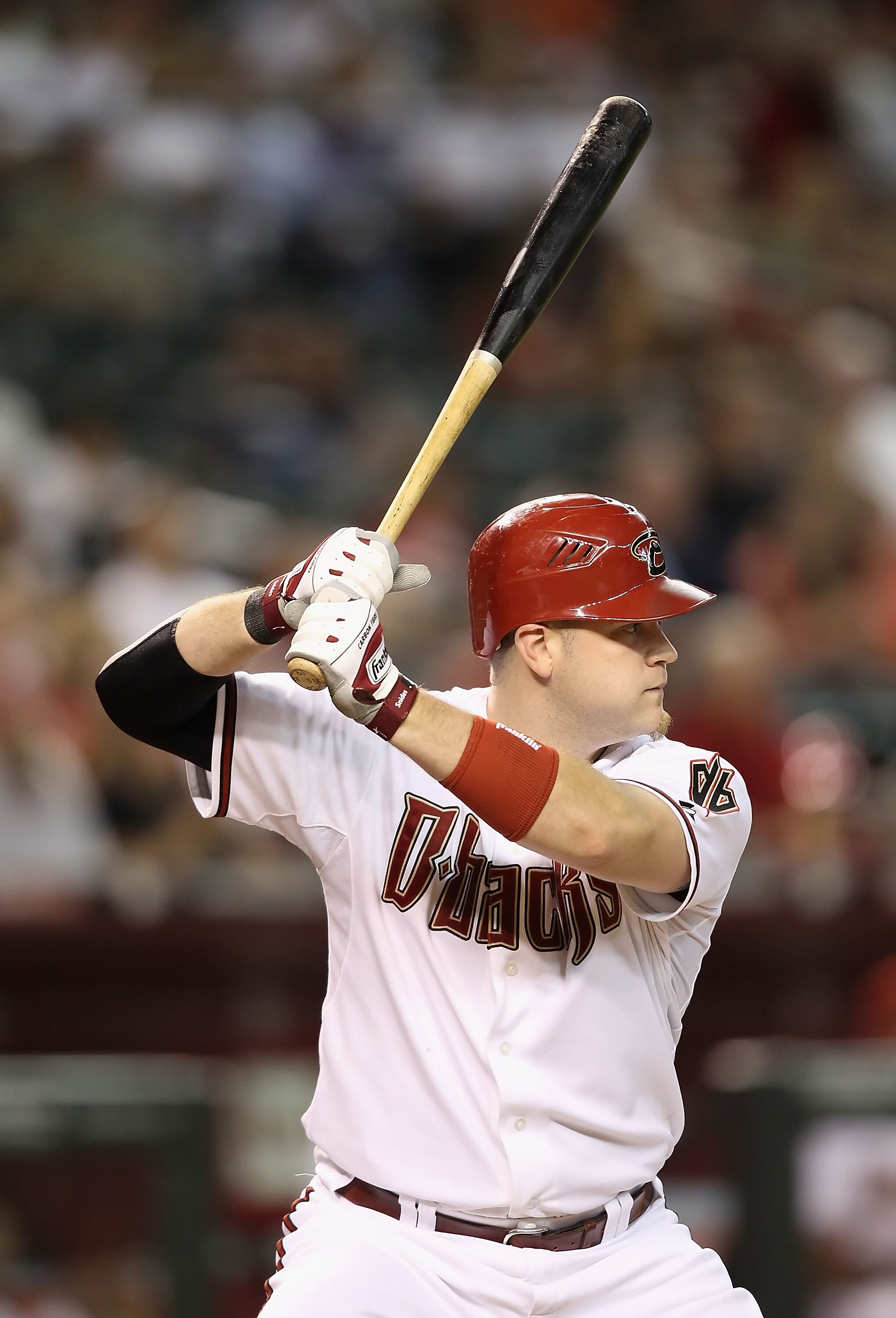 PHOENIX - JULY 08:  Chris Snyder #19 of the Arizona Diamondbacks at bat during the Major League Baseball game against the Florida Marlins at Chase Field on July 8, 2010 in Phoenix, Arizona.  The Diamondbacks defeated the Marlins 10-4.  (Photo by Christian