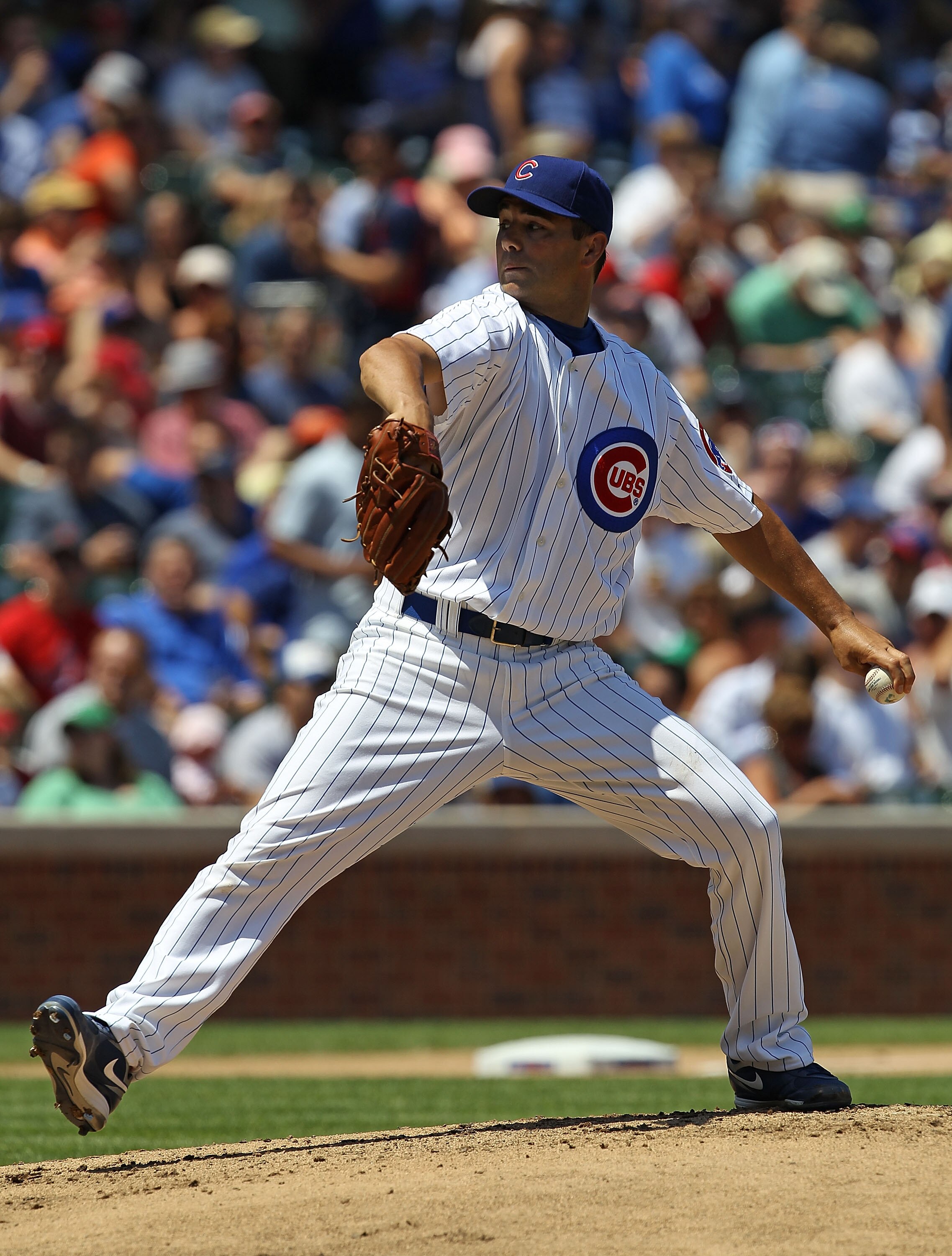 CHICAGO - JULY 16: Starting pitcher Ted Lilly #30 of the Chicago Cubs delivers the ball against the Philadelphia Phillies at Wrigley Field on July 16, 2010 in Chicago, Illinois. The Cubs defeated the Phillies 4-3. (Photo by Jonathan Daniel/Getty Images)