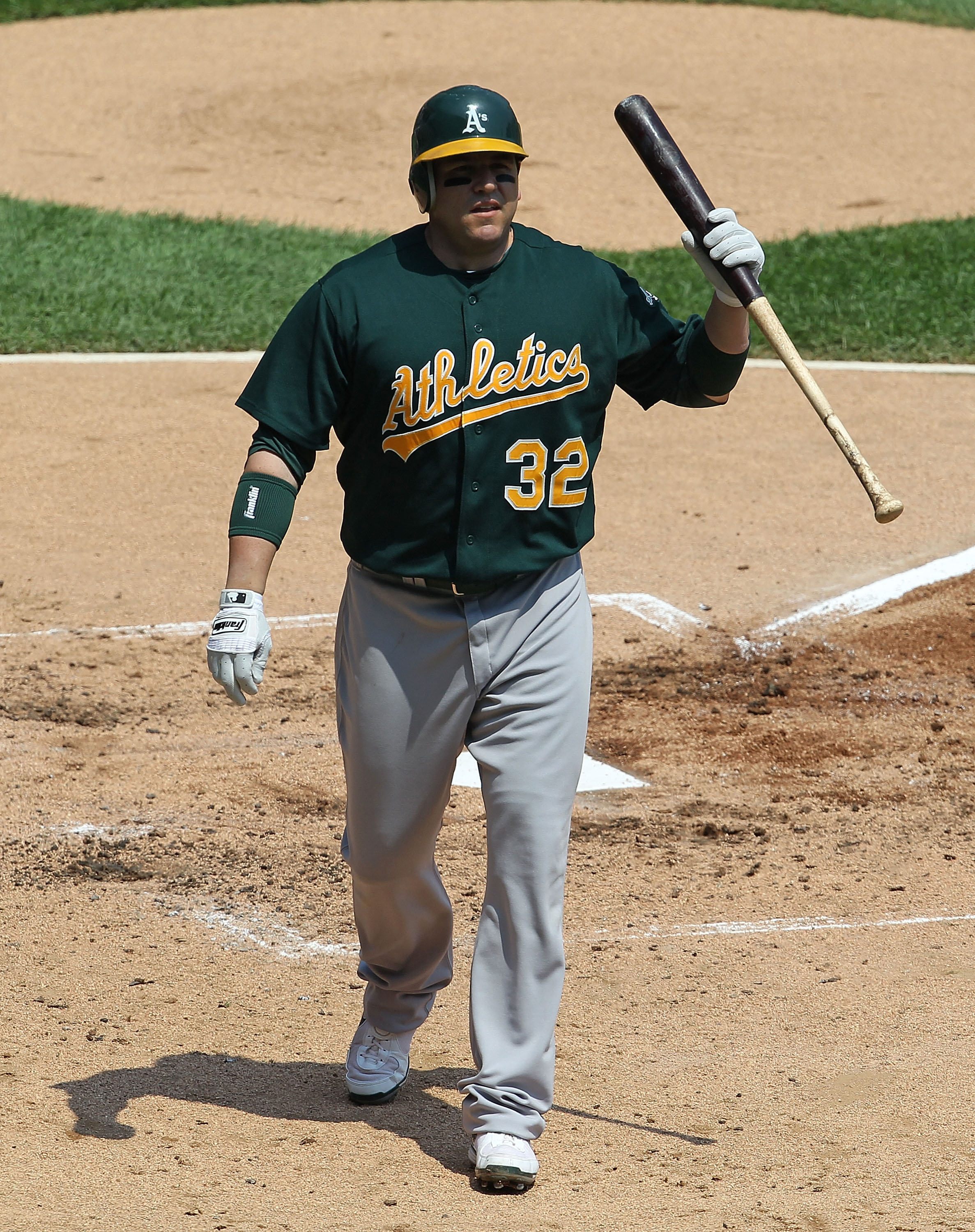 CHICAGO - AUGUST 01: Jack Cust #32 of the Oakland Athletics walks back to the dugout after striking out against Gavin Floyd of the Chicago White Sox at U.S. Cellular Field on August 1, 2010 in Chicago, Illinois. The White Sox defeated the Athletics 4-1. (