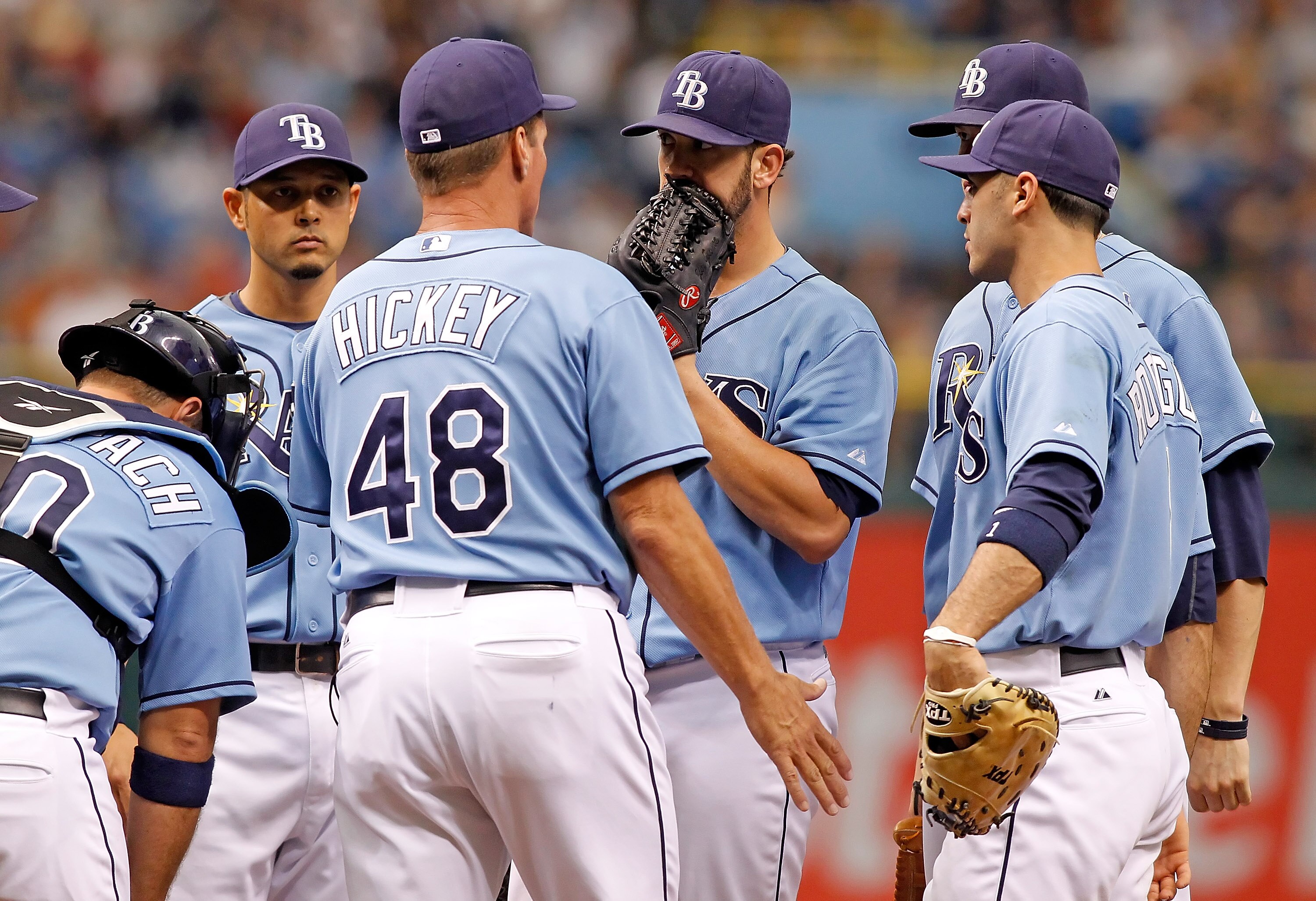 ST. PETERSBURG - AUGUST 01:  Pitching coach Jim Hickey #48 of the Tampa Bay Rays talks with pitcher James Shields #33 during the game against the New York Yankees at Tropicana Field on August 1, 2010 in St. Petersburg, Florida. Tampa Bay beat the Yankees 