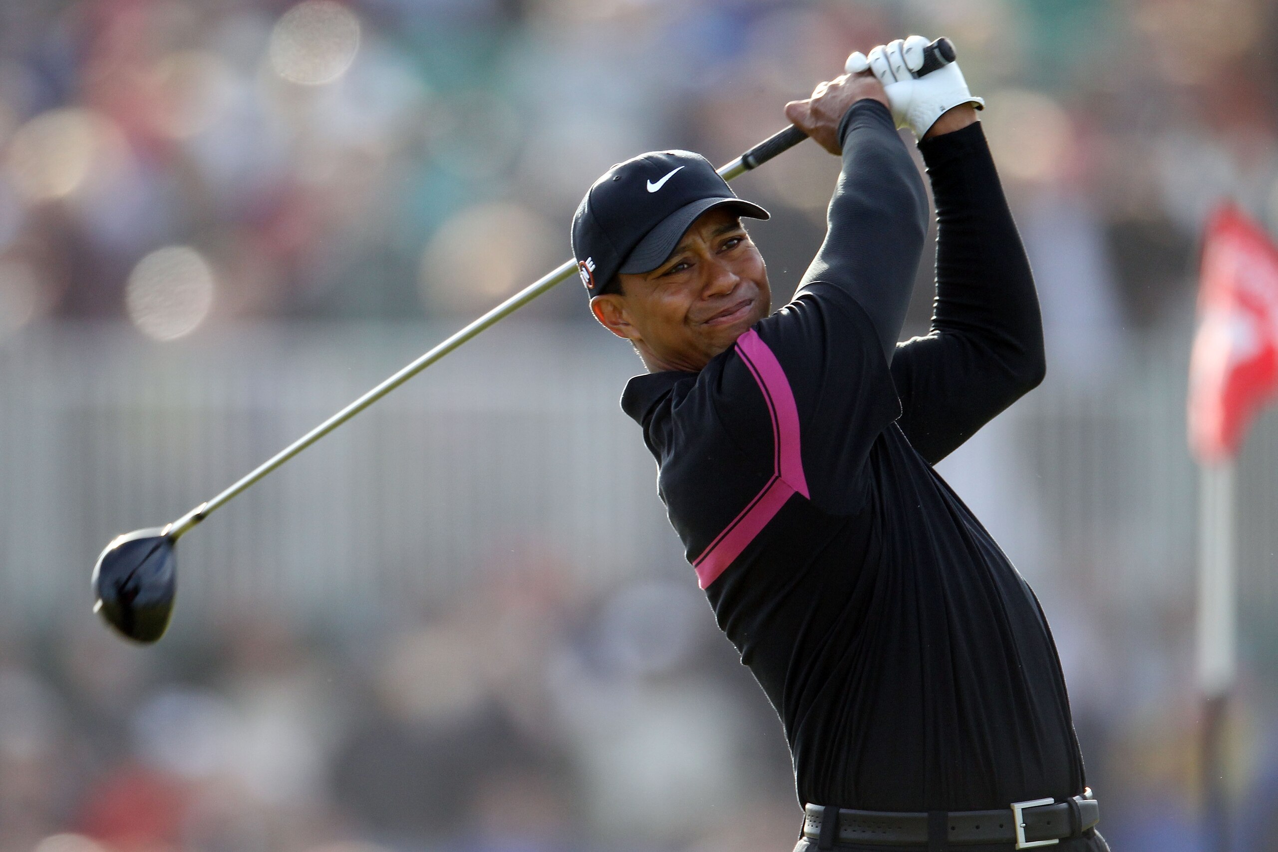 ST ANDREWS, SCOTLAND - JULY 17:  Tiger Woods of the USA tees off on the 18th hole during the third round of the 139th Open Championship on the Old Course, St Andrews on July 17, 2010 in St Andrews, Scotland.  (Photo by David Cannon/Getty Images)