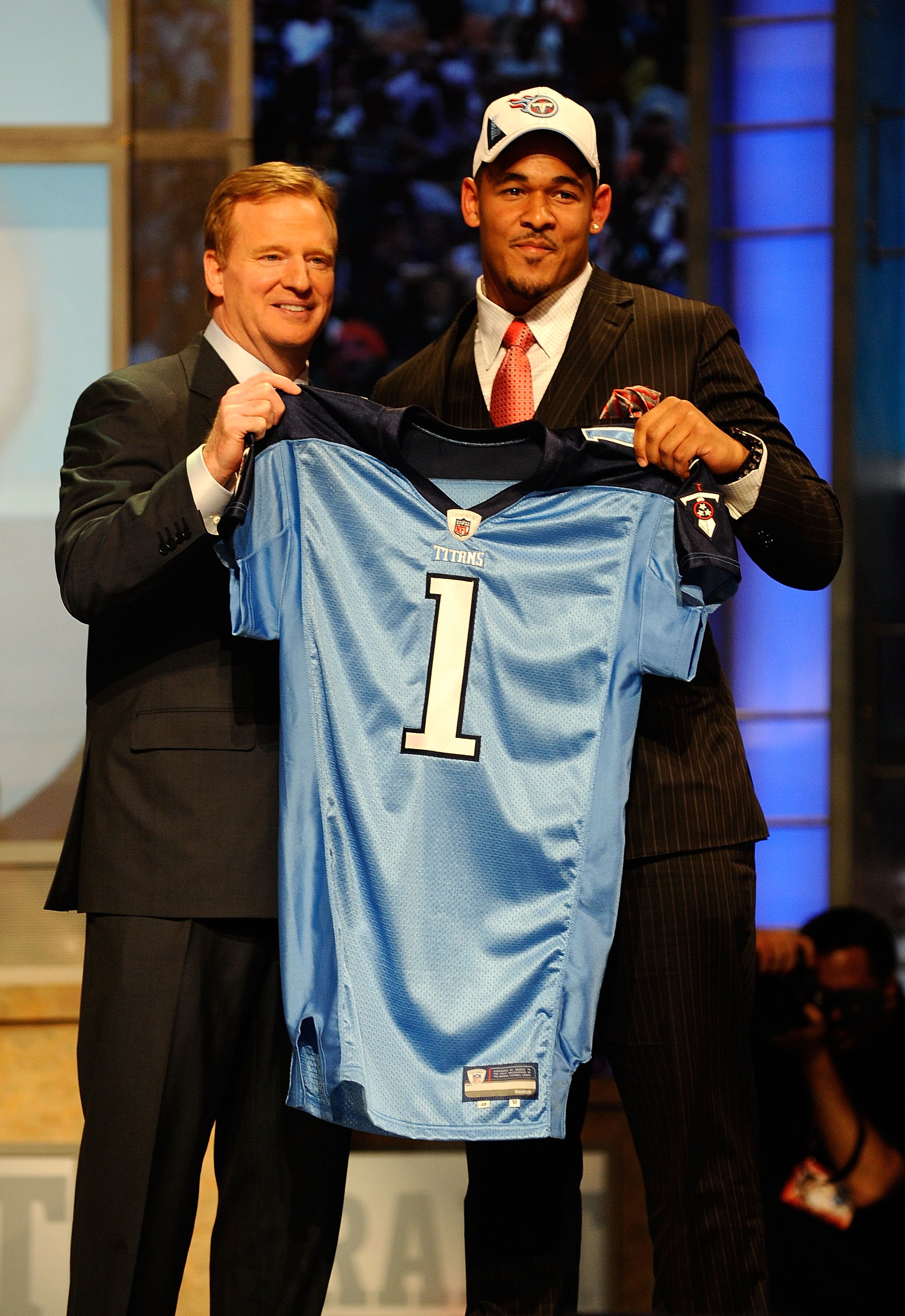 NEW YORK - APRIL 22:  Derrick Morgan from the Georgia Tech Yellow Jackets poses with NFL Commissioner Roger Goodell as they hold up a Tennessee Titans jersey after the Titans selected Morgan number 16 overall during the first round of the 2010 NFL Draft a