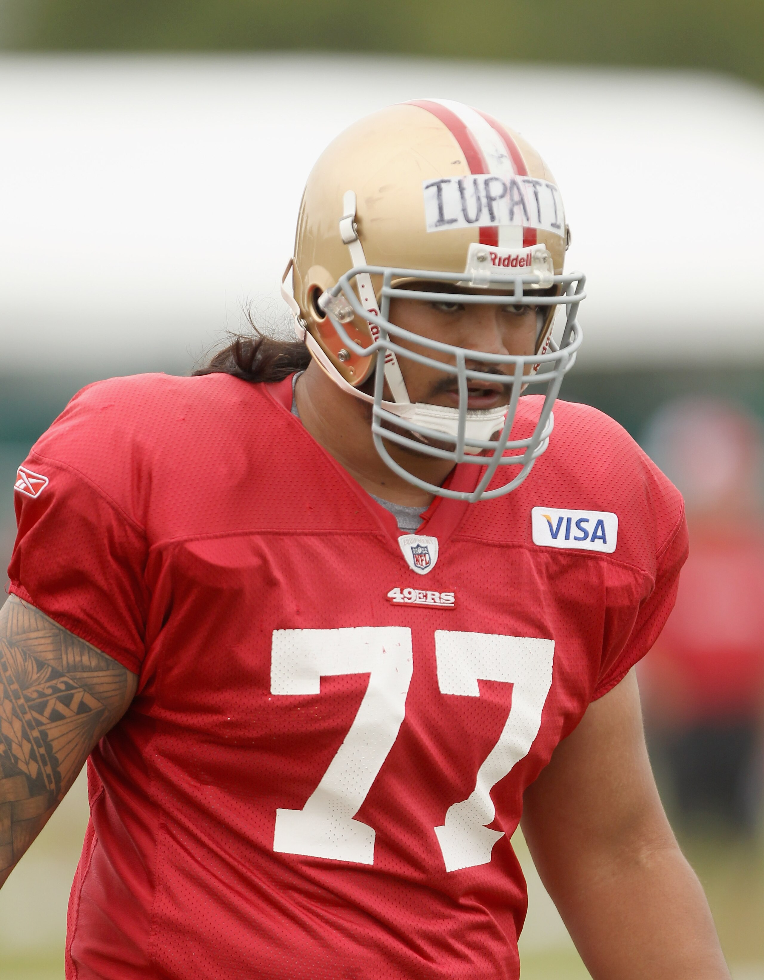 SANTA CLARA, CA - AUGUST 02:  Mike Iupati #77 works out during the San Francisco 49ers training camp at their training complex on August 2, 2010 in Santa Clara, California.  (Photo by Ezra Shaw/Getty Images)