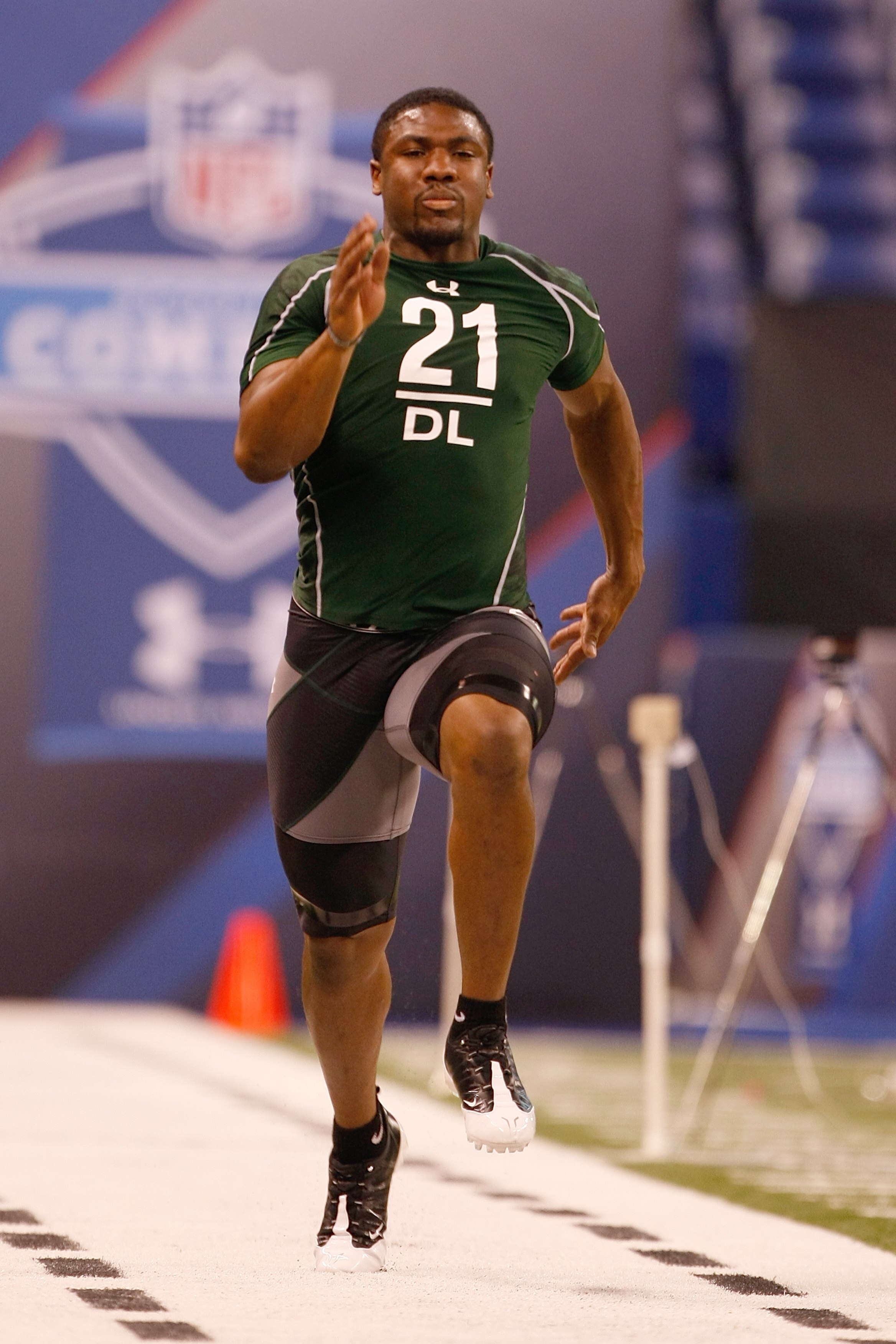 INDIANAPOLIS, IN - MARCH 1: Defensive lineman Jerry Hughes of Texas Christian runs the 40 yard dash during the NFL Scouting Combine presented by Under Armour at Lucas Oil Stadium on March 1, 2010 in Indianapolis, Indiana. (Photo by Scott Boehm/Getty Image
