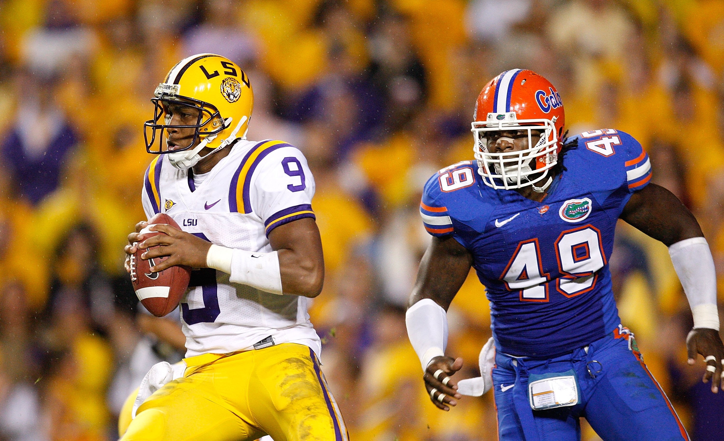 BATON ROUGE, LA - OCTOBER 10:  Jermaine Cunningham #49 of the Florida Gators against quarterback Jordan Jefferson #9 of the Louisiana State University Tigers at Tiger Stadium on October 10, 2009 in Baton Rouge, Louisiana.  (Photo by Kevin C. Cox/Getty Ima