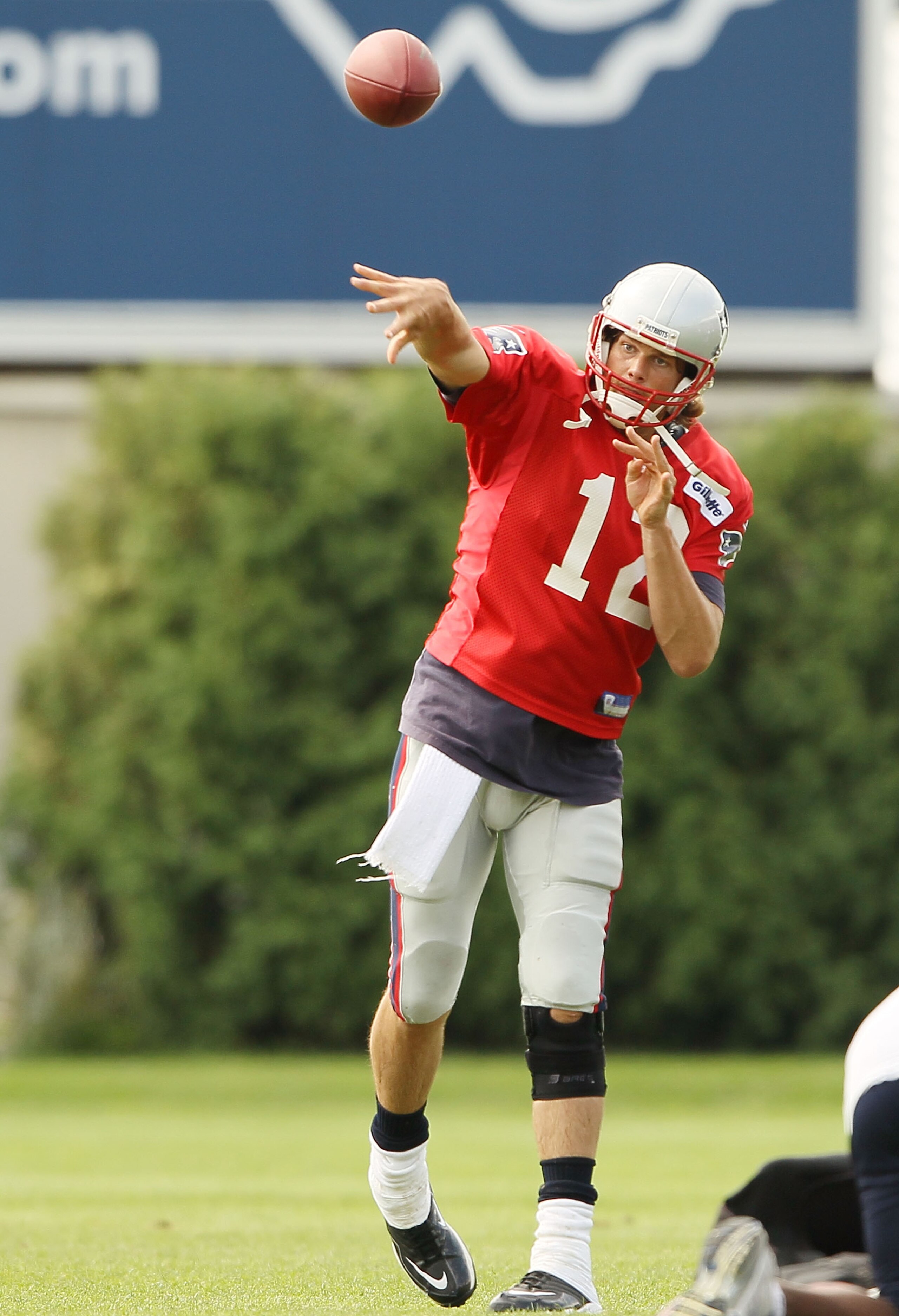 FOXBORO, MA - AUGUST 02:  Quarterback Tom Brady #12 of the New England Patriots passes the ball during training camp on August 2, 2010 at Gillette Stadium in Foxboro, Massachusetts.  (Photo by Elsa/Getty Images)
