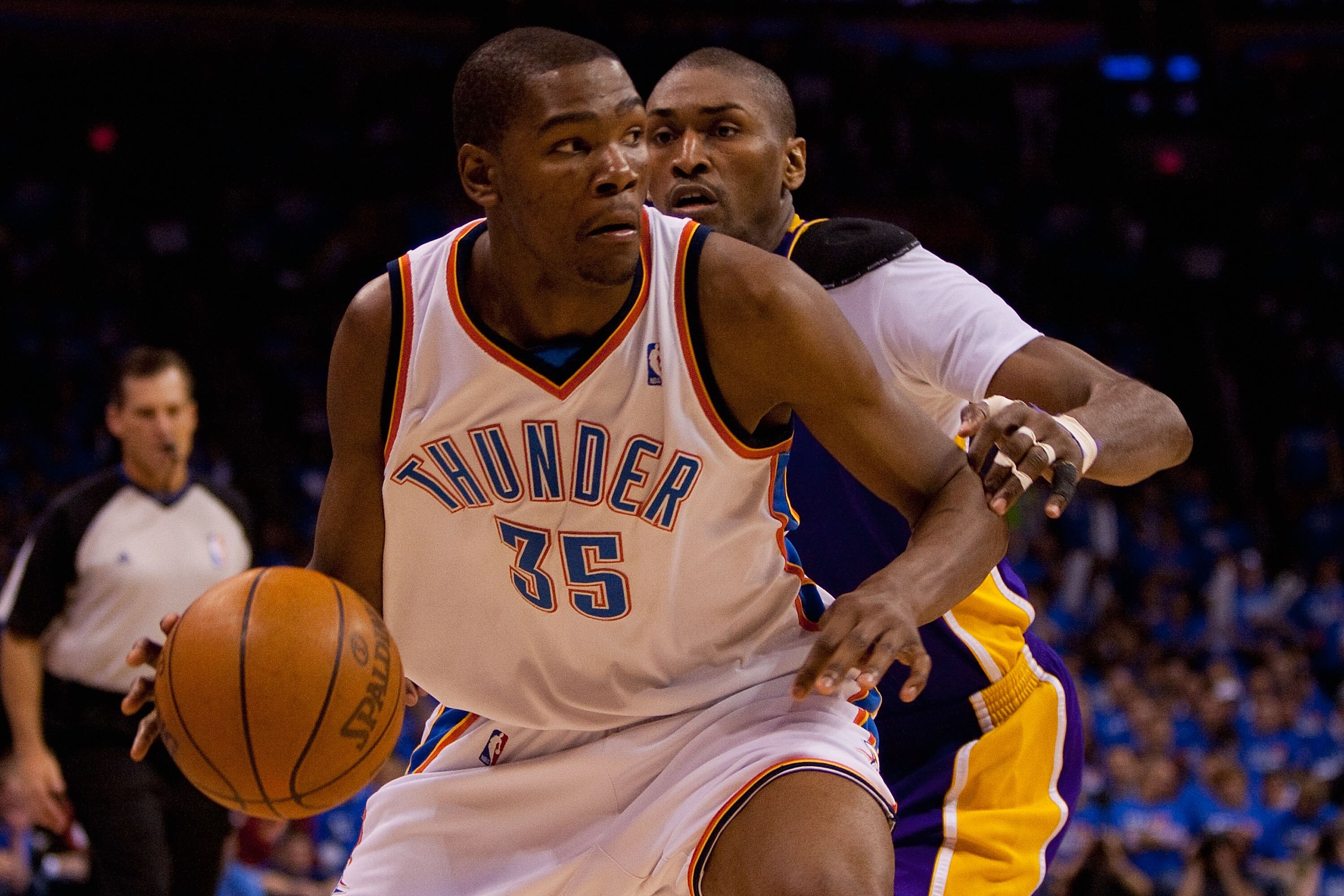 OKLAHOMA CITY - APRIL 30: Kevin Durant #35 of the Oklahoma City Thunder drives to the basket  against Ron Artest #37 of the Los Angeles Lakers during Game Six of the Western Conference Quarterfinals of the 2010 NBA Playoffs on April 30, 2010 at the Ford C