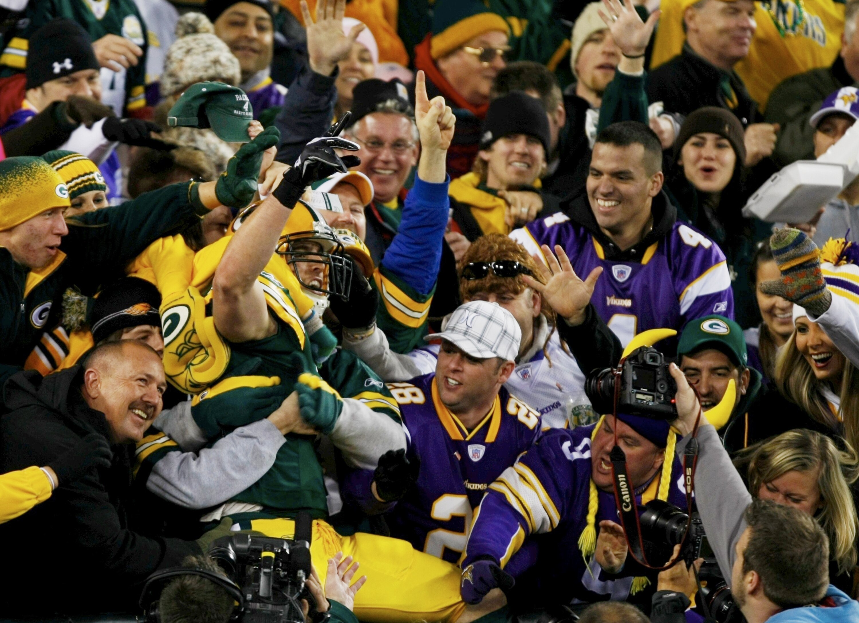 GREEN BAY, WI - NOVEMBER 01:  Spencer Havner #41 of the Green Bay Packers leaps into the stands to celebrate his touchdown with fans during the third quarter of the game against the Minnesota Vikings at Lambeau Field on November 1, 2009 in Green Bay, Wisc