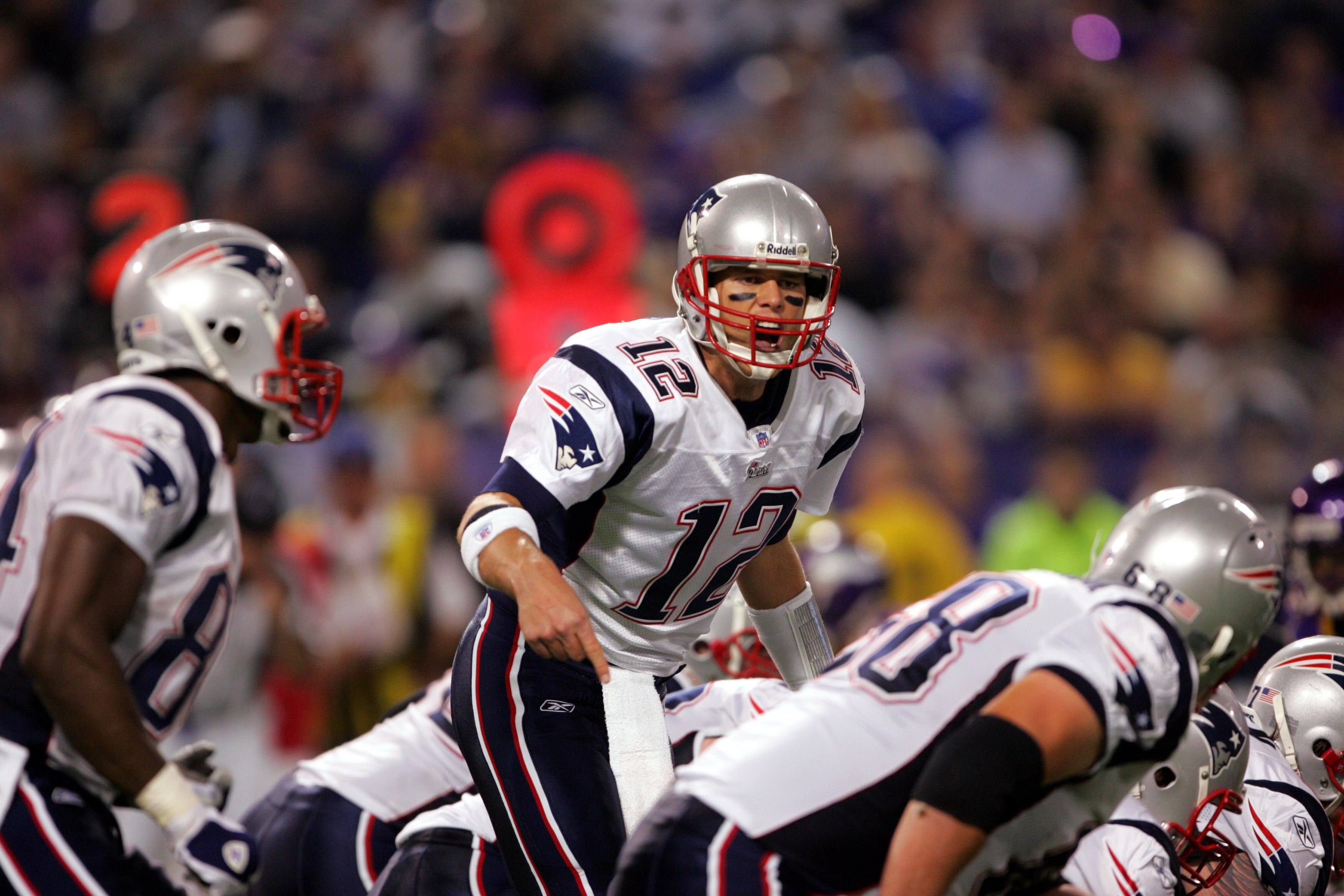 MINNEAPOLIS, MN - OCTOBER 30:  Quarterback Tom Brady #12 of the New England Patriots calls a play during the game against the Minnesota Vikings on October 30, 2006 at the Metrodome in Minneapolis, Minnesota. The Patriots won 31-7. (Photo by Stephen Dunn/G