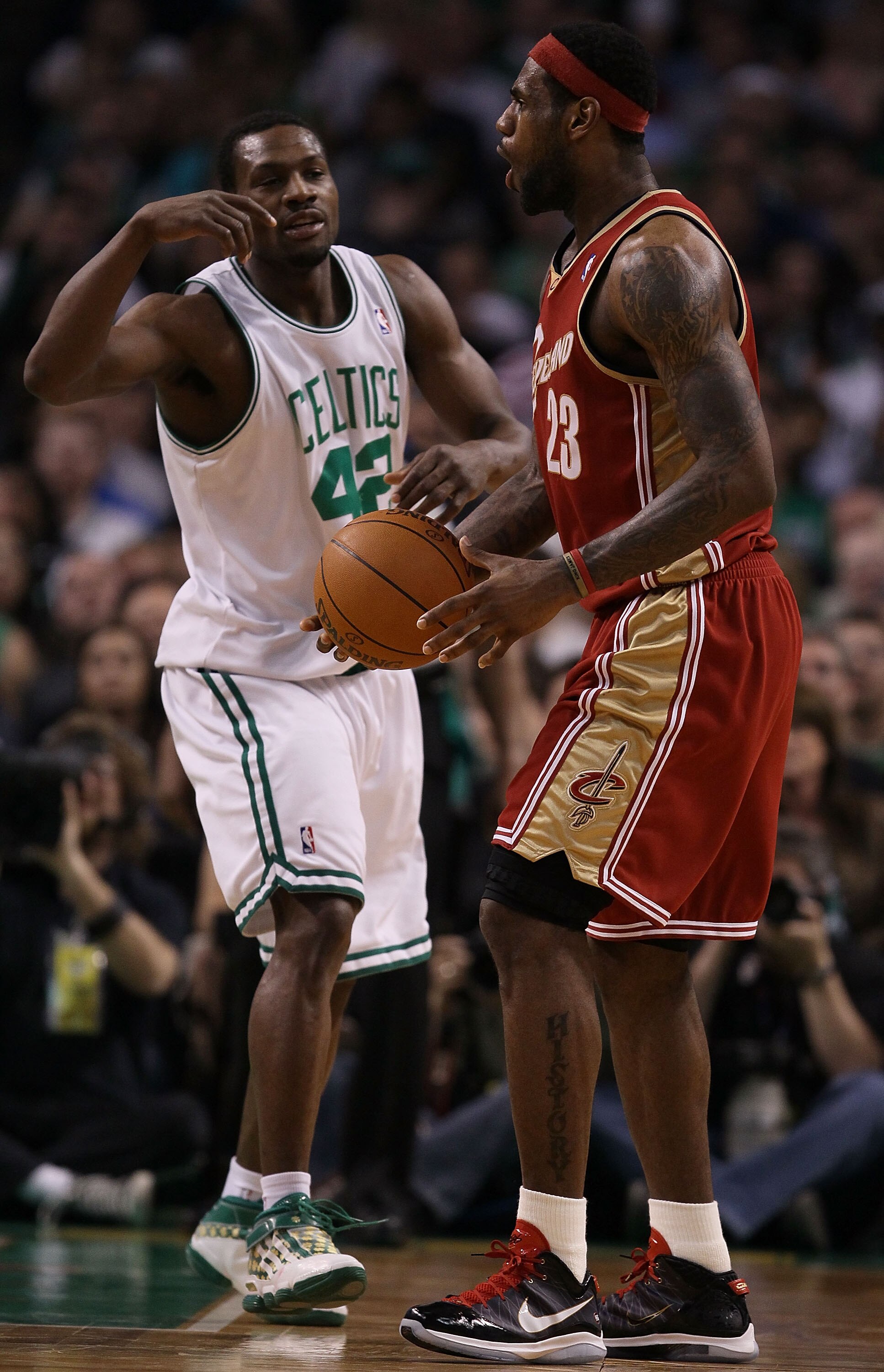 BOSTON - MAY 13:  LeBron James #23 of the Cleveland Cavaliers reacts to a foul call as Tony Allen #42 of the Boston Celtics celebrates during Game Six of the Eastern Conference Semifinals of the 2010 NBA playoffs at TD Garden on May 13, 2010 in Boston, Ma