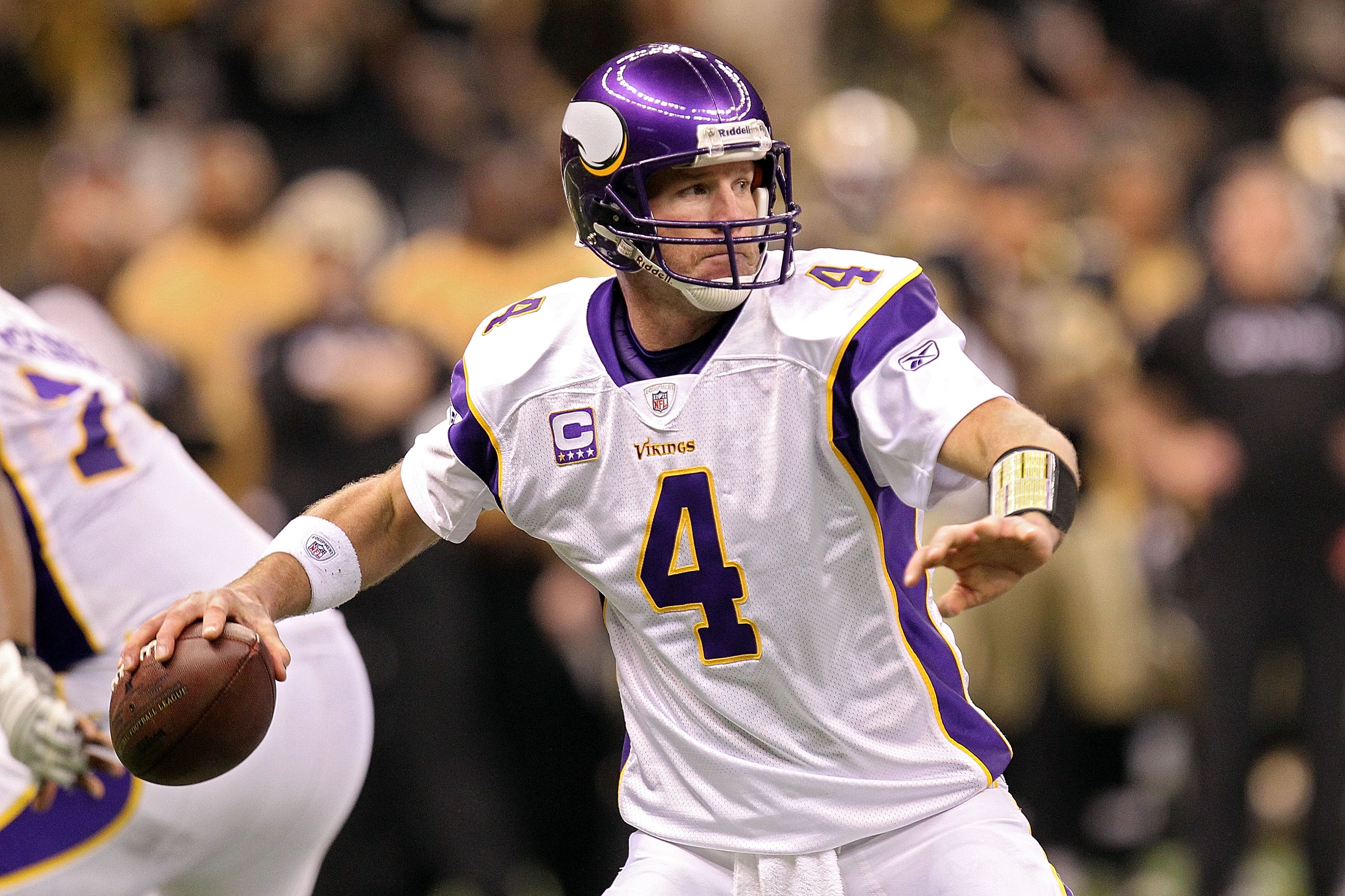 NEW ORLEANS - JANUARY 24:  Brett Favre #4 of the Minnesota Vikings drops back to pass against the New Orleans Saints during the NFC Championship Game at the Louisana Superdome on January 24, 2010 in New Orleans, Louisiana.  (Photo by Ronald Martinez/Getty