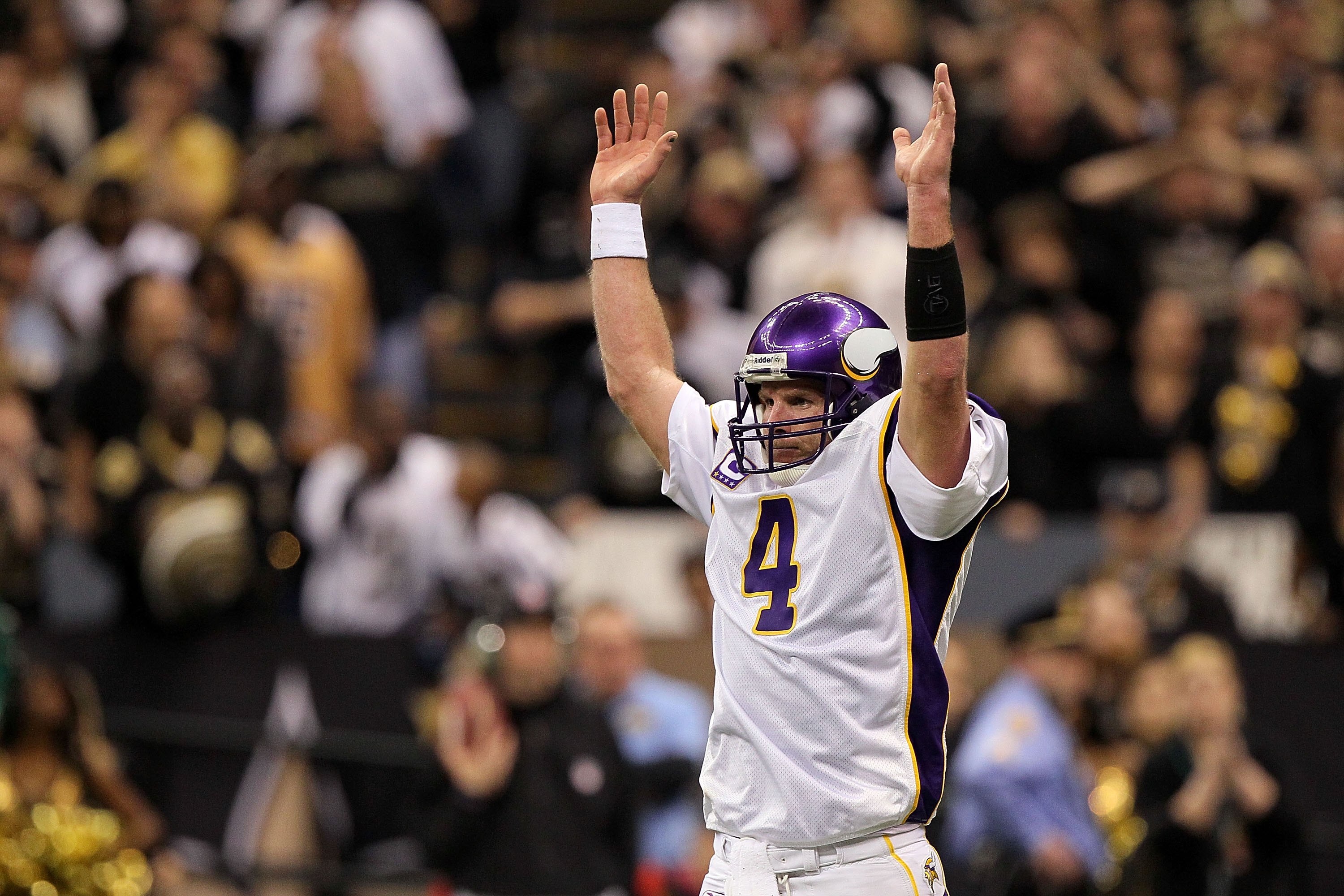 NEW ORLEANS - JANUARY 24:  Brett Favre #4 of the Minnesota Vikings reacts after the Vikings scored a touchdown against the New Orleans Saints during the NFC Championship Game at the Louisiana Superdome on January 24, 2010 in New Orleans, Louisiana. The Sa