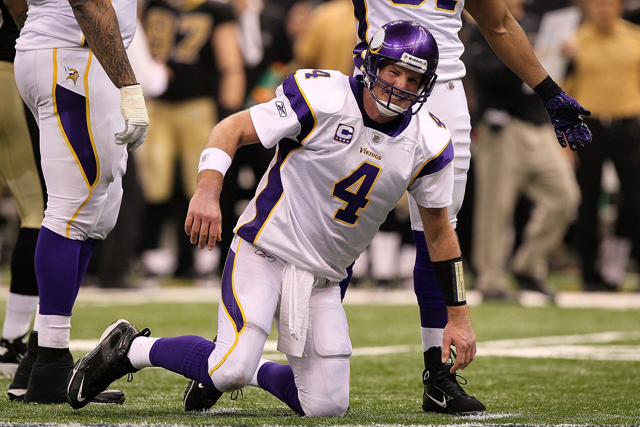 NEW ORLEANS - JANUARY 24: Brett Favre #4 of the Minnesota Vikings reacts after taking a hard hit in the second half against the New Orleans Saints during the NFC Championship Game at the Louisiana Superdome on January 24, 2010 in New Orleans, Louisiana. NEW ORLEANS - JANUARY 24: Brett Favre #4 of the Minnesota Vikings reacts after taking a hard hit in the second half against the New Orleans Saints during the NFC Championship Game at the Louisiana Superdome on January 24, 2010 in New Orleans, Louisiana.