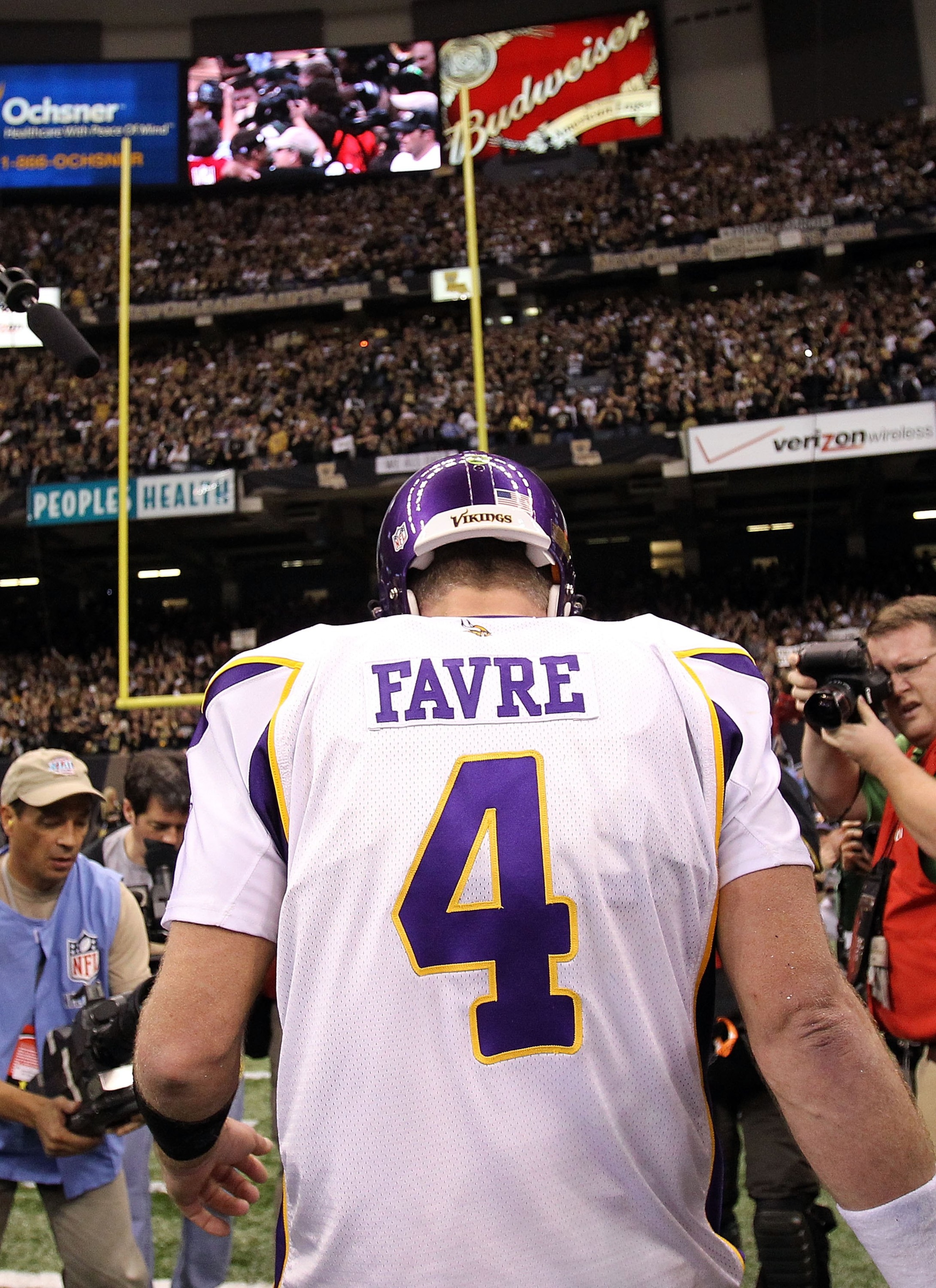 NEW ORLEANS - JANUARY 24:  Brett Favre #4 of the Minnesota Vikings walks off the field after the Vikings lost to the New Orleans Saints 31-28 in overtime during the NFC Championship Game at the Louisiana Superdome on January 24, 2010 in New Orleans, Louis