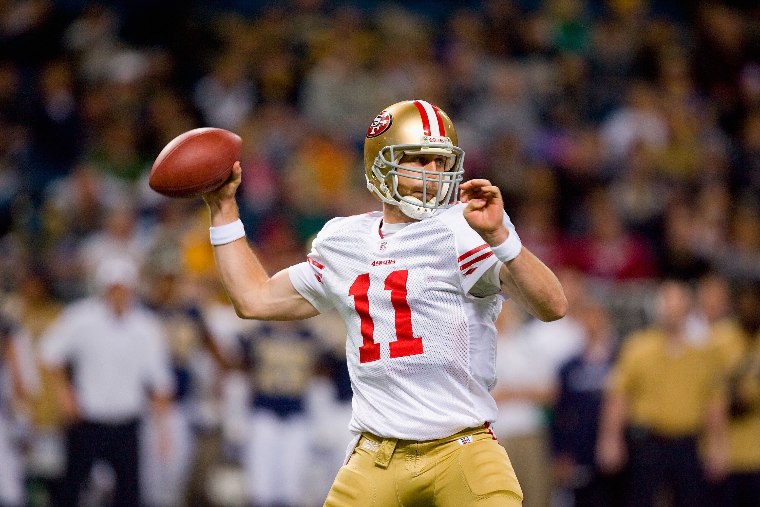 ST. LOUIS - JANUARY 3: Quarterback Alex Smith #11 of the San Francisco 49ers looks to pass the ball during the game against the St. Louis Rams at the Edward Jones Dome on January 3, 2010 in St. Louis, Missouri.  The 49ers beat the Rams 28-6.  (Photo by Di