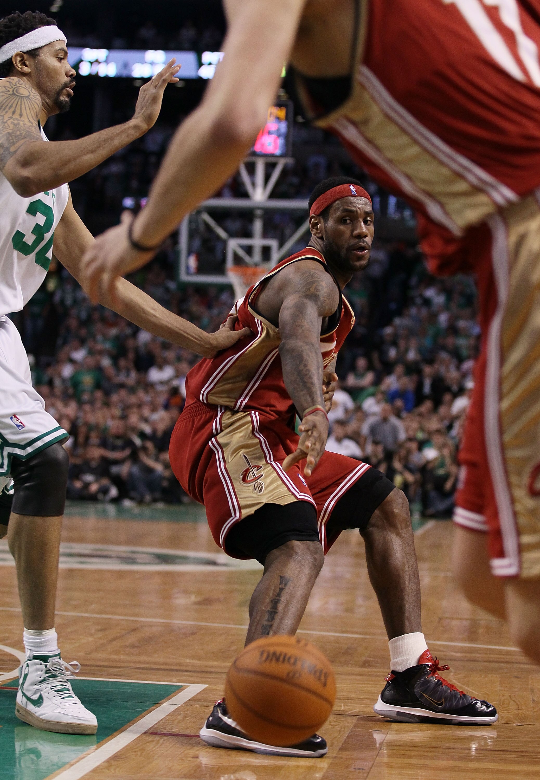 BOSTON - MAY 13:  LeBron James #23 of the Cleveland Cavaliers passes the ball to Anderson Varejao #17 as Rasheed Wallace #30 of the Boston Celtics defends during Game Six of the Eastern Conference Semifinals of the 2010 NBA playoffs at TD Garden on May 13