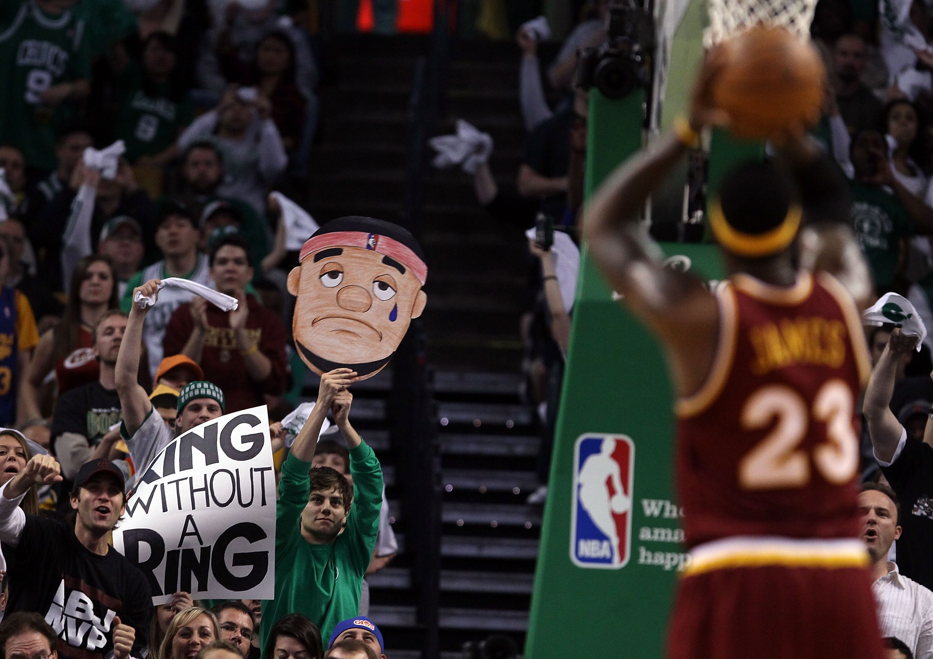 BOSTON - MAY 09:  Fans try to distract LeBron James #23 of the Cleveland Cavaliers as he tries to shoot a free throw in the first half against the Boston Celtics during Game Four of the Eastern Conference Semifinals of the 2010 NBA playoffs at TD Garden o