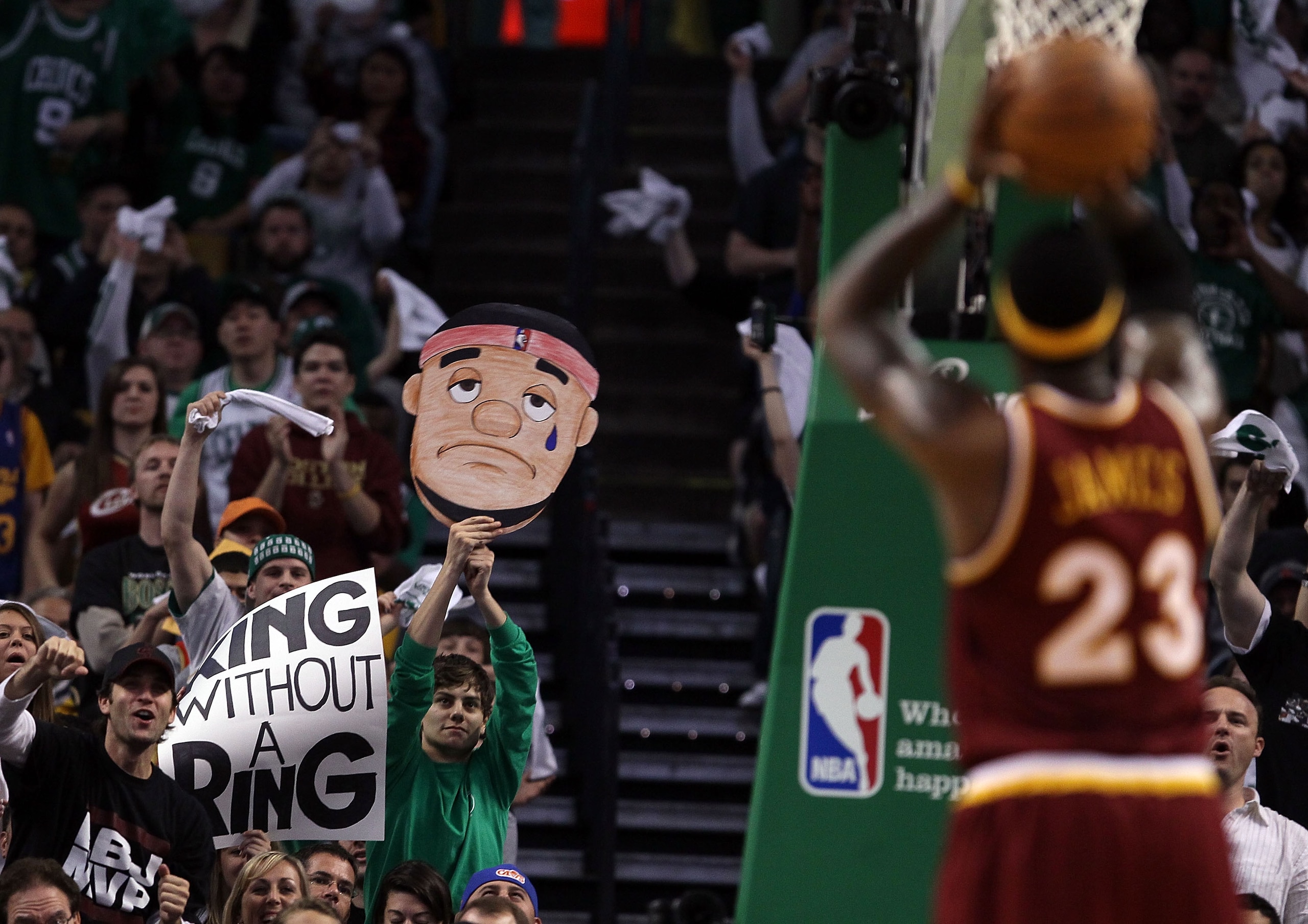 BOSTON - MAY 09:  Fans try to distract LeBron James #23 of the Cleveland Cavaliers as he tries to shoot a free throw in the first half against the Boston Celtics during Game Four of the Eastern Conference Semifinals of the 2010 NBA playoffs at TD Garden o