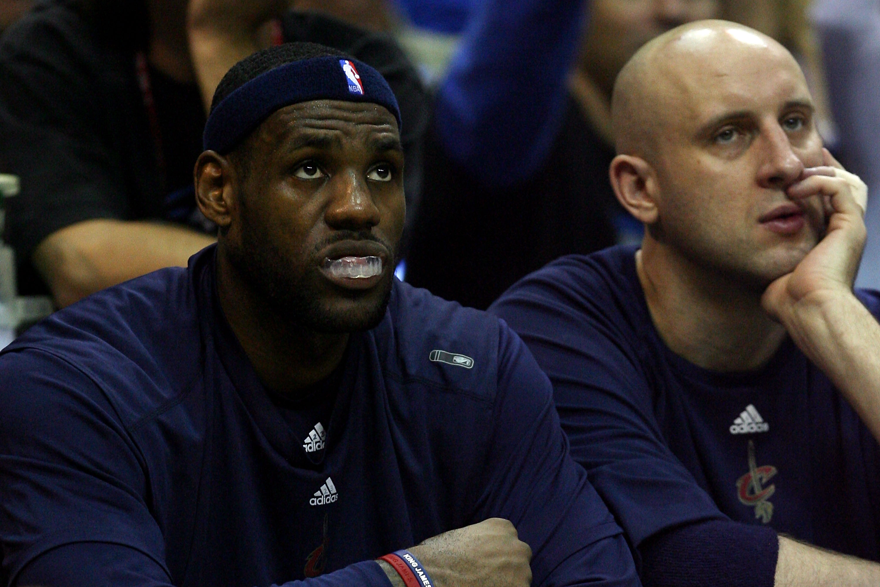 ORLANDO, FL - MAY 26:  LeBron James #23 and Zydrunas Ilgauskas #11 of the Cleveland Cavaliers look on from the bench during the game against the Orlando Magic in Game Four of the Eastern Conference Finals during the 2009 NBA Playoffs at the Amway Arena on
