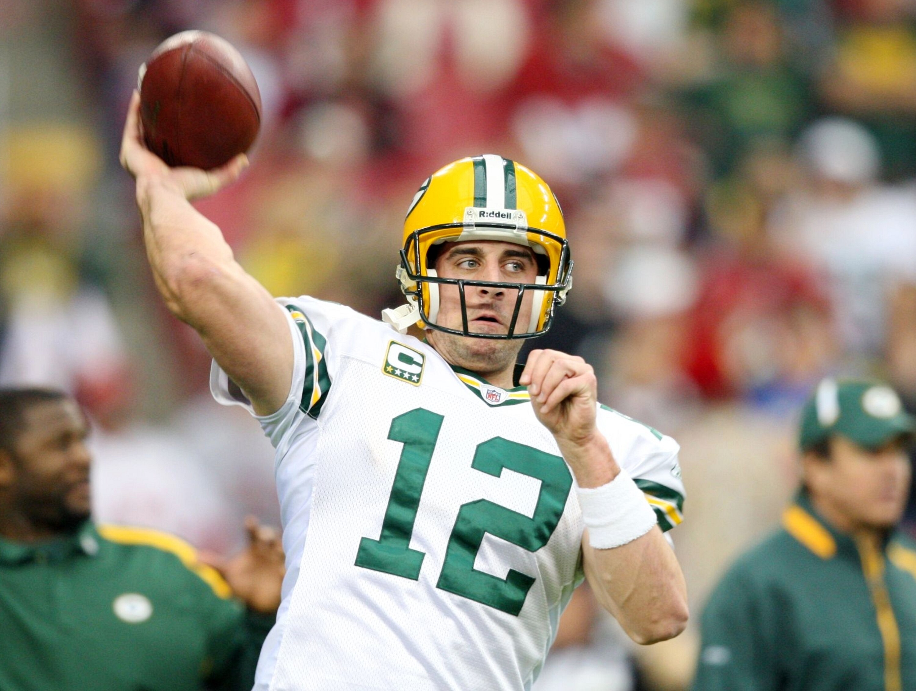 GLENDALE, AZ - JANUARY 10:  Quarterback Aaron Rodgers #12 of the Green Bay Packers warms up before the 2010 NFC wild-card playoff game against the Arizona Cardinals at University of Phoenix Stadium on January 10, 2010 in Glendale, Arizona.  (Photo by Chri