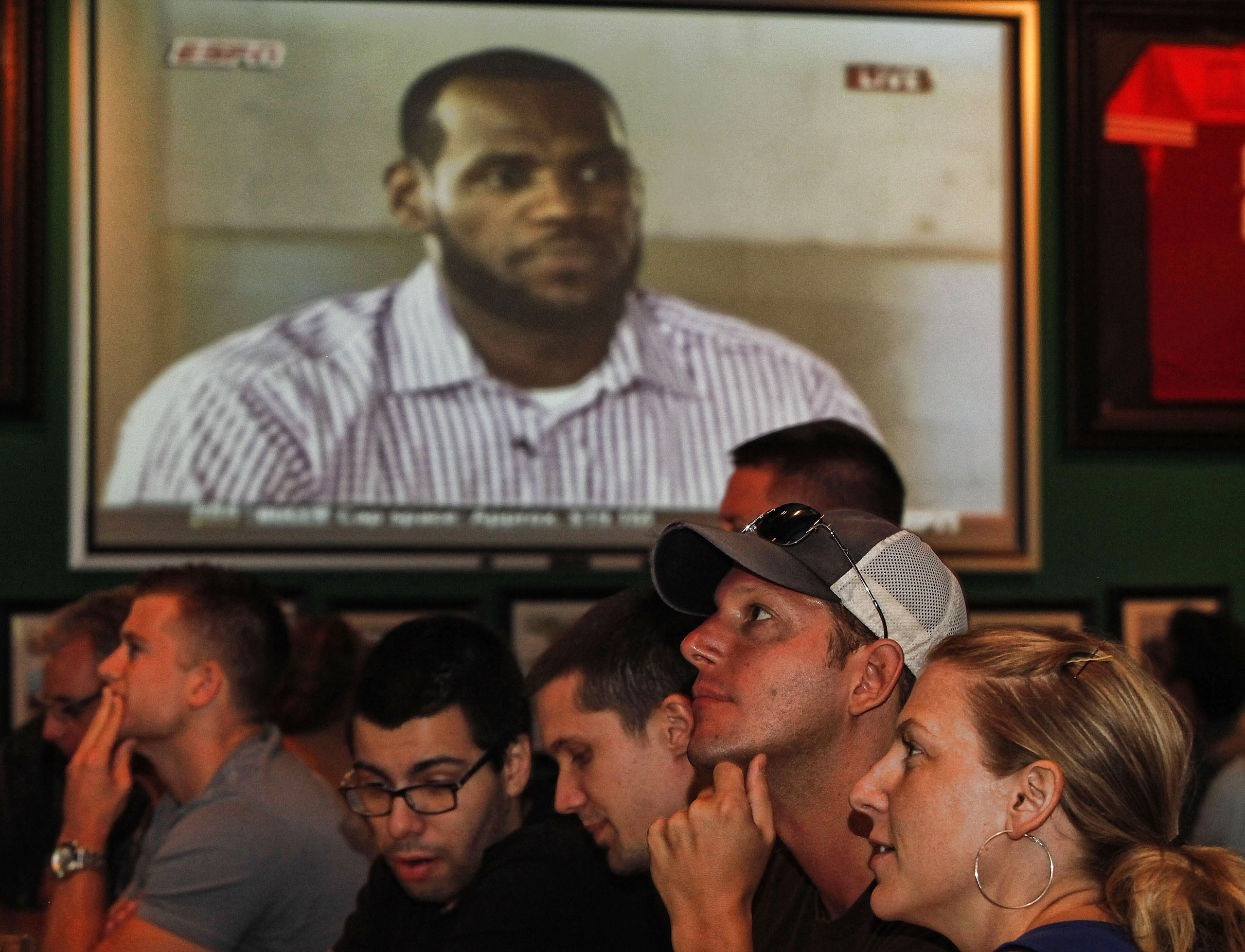 BOCA RATON, FL - JULY 08:  LeBron James announces he will join the Miami Heat during a televised interview as fans look on at Duffy's July 8, 2010 in Boca Raton, Florida.  (Photo by Marc Serota/Getty Images)