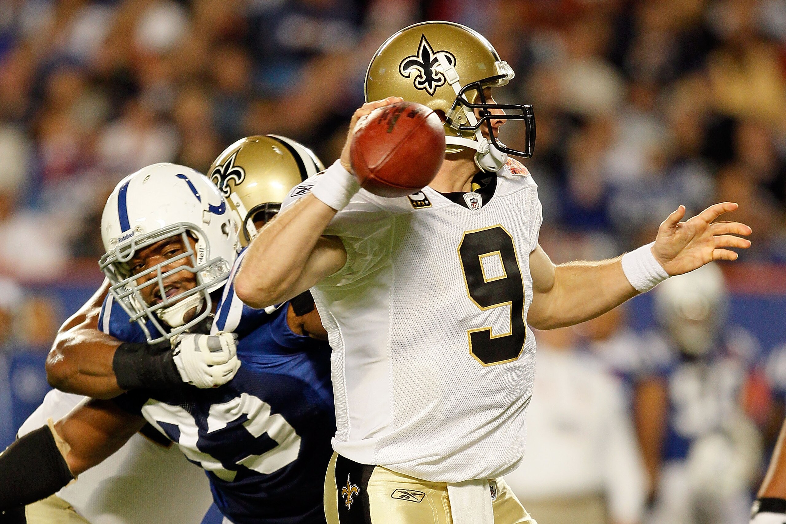 MIAMI GARDENS, FL - FEBRUARY 07:  Dwight Freeney #93 of the Indianapolis Colts pressures Drew Brees #9 of the New Orleans Saints during Super Bowl XLIV on February 7, 2010 at Sun Life Stadium in Miami Gardens, Florida.  (Photo by Andy Lyons/Getty Images)