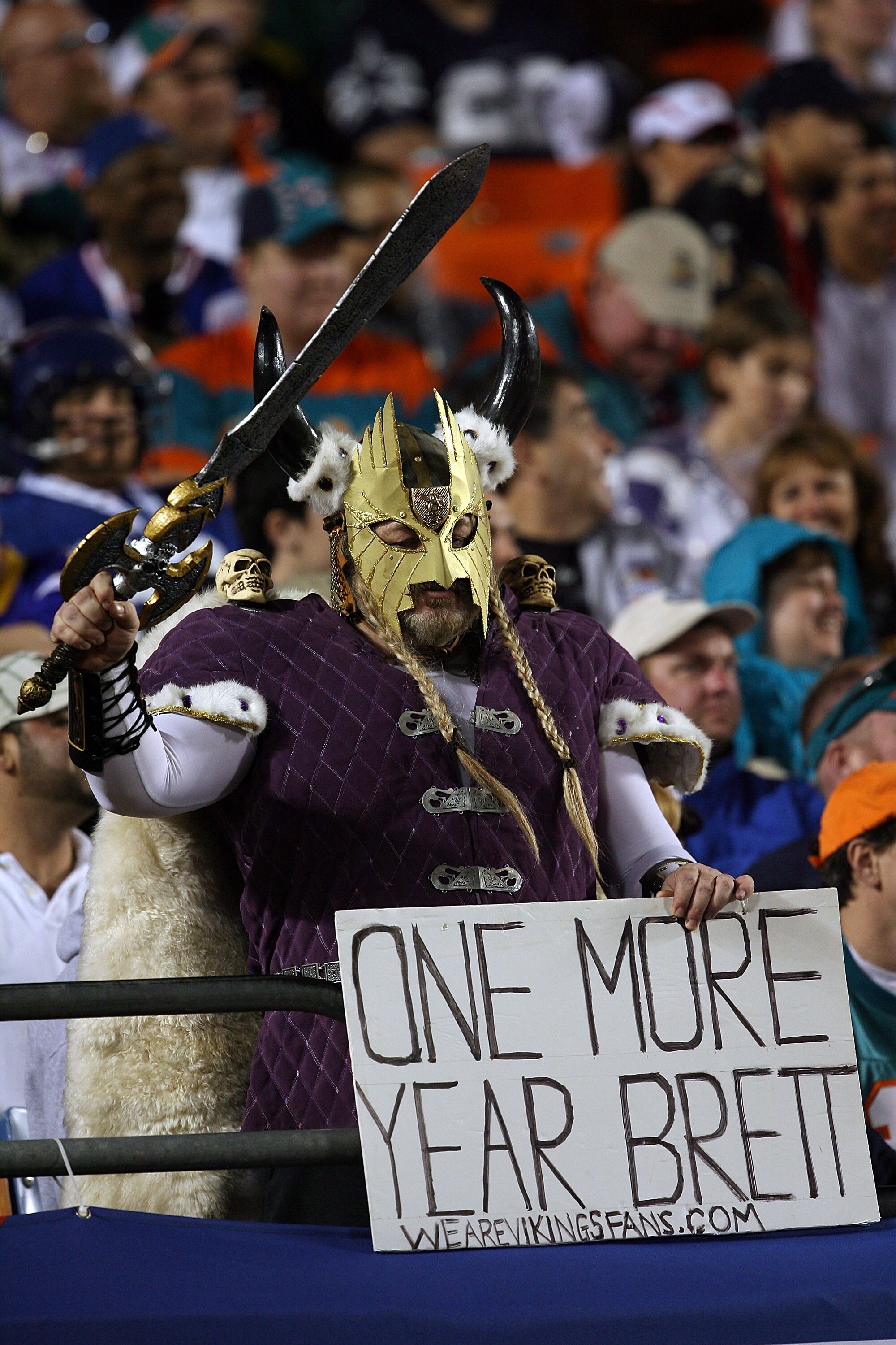 MIAMI GARDENS, FL - JANUARY 31:  A Minnesota Vikings fans holds a sign that reads 'One More Year Brett' during the 2010 AFC-NFC Pro Bowl at Sun Life Stadium on January 31, 2010 in Miami Gardens, Florida.  (Photo by Doug Benc/Getty Images)