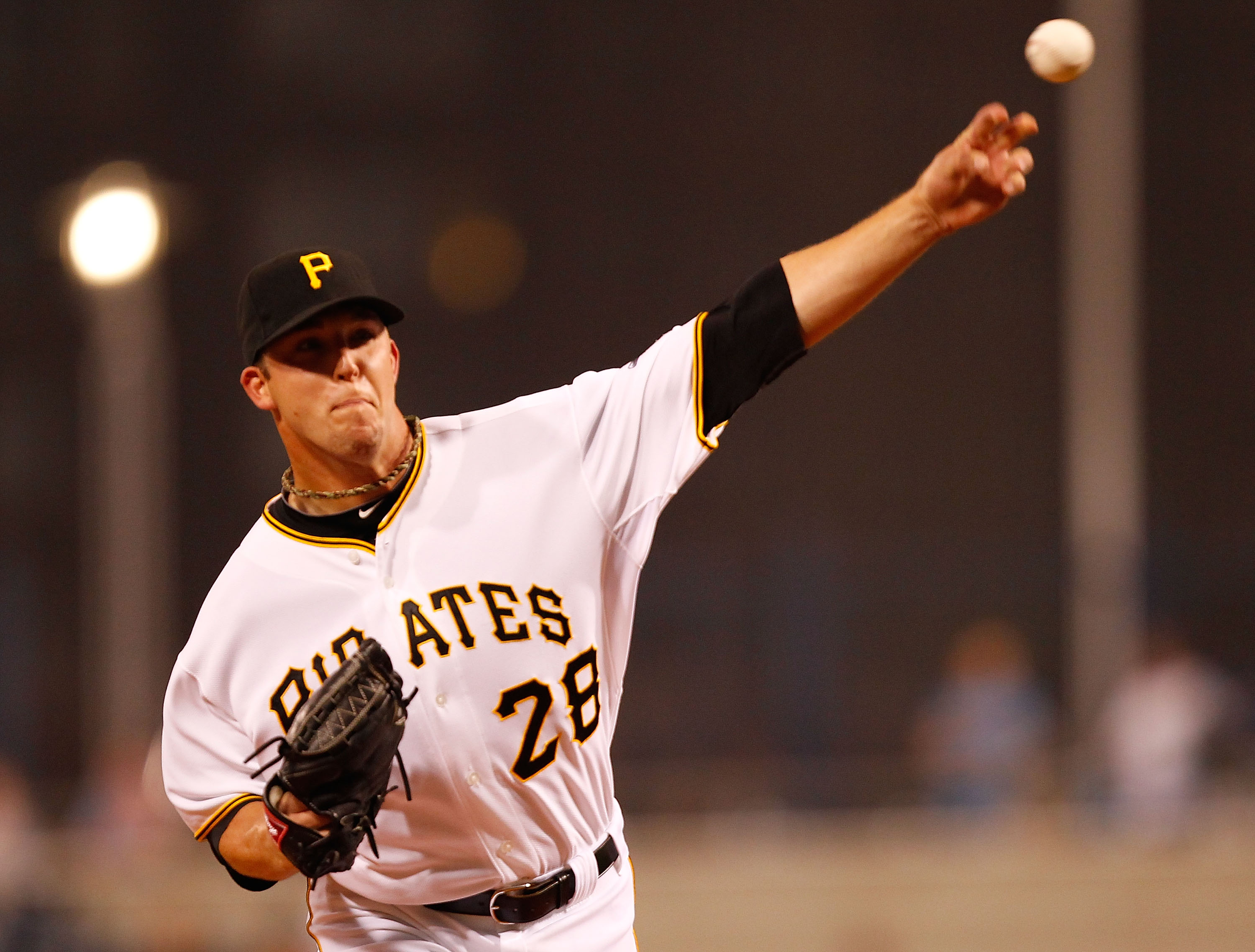 PITTSBURGH - AUGUST 03:  Paul Maholm #28 of the Pittsburgh Pirates pitches against the Cincinnati Reds during the game on August 3, 2010 at PNC Park in Pittsburgh, Pennsylvania.  (Photo by Jared Wickerham/Getty Images)