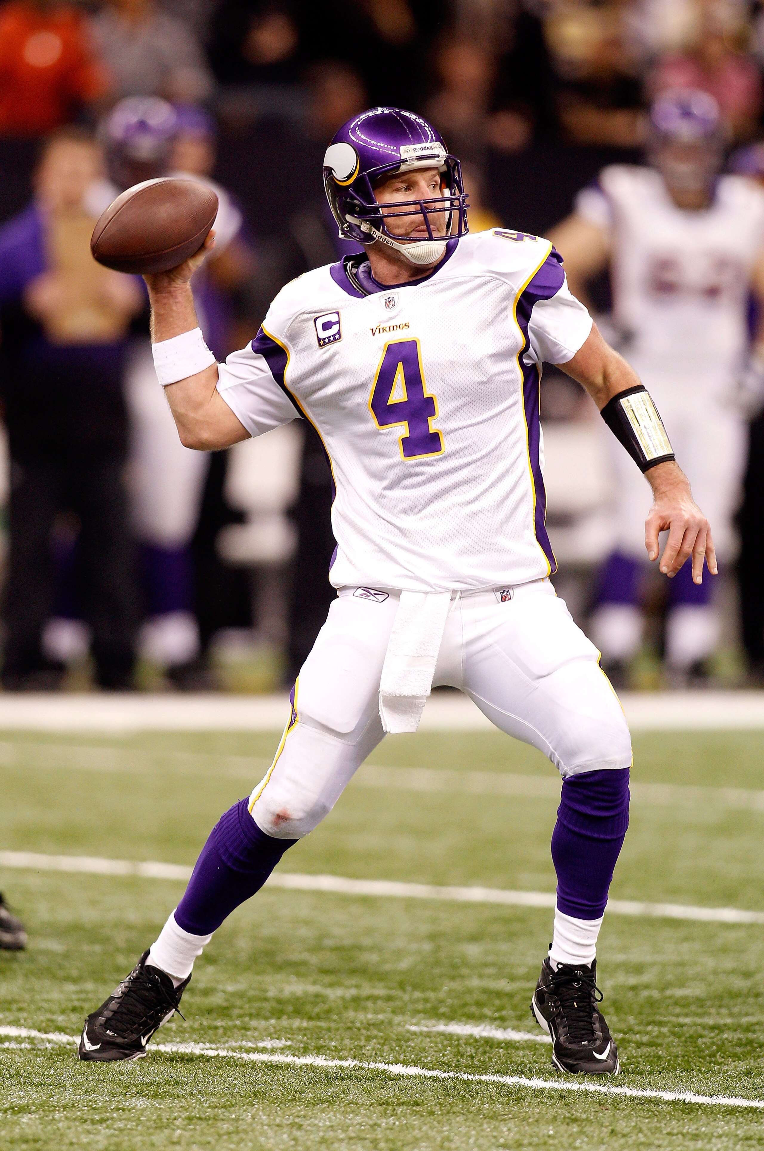 NEW ORLEANS - JANUARY 24:  Brett Favre #4 of the Minnesota Vikings throws a pass against the New Orleans Saints during the NFC Championship Game at the Louisiana Superdome on January 24, 2010 in New Orleans, Louisiana. The Saints won 31-28 in overtime.  (