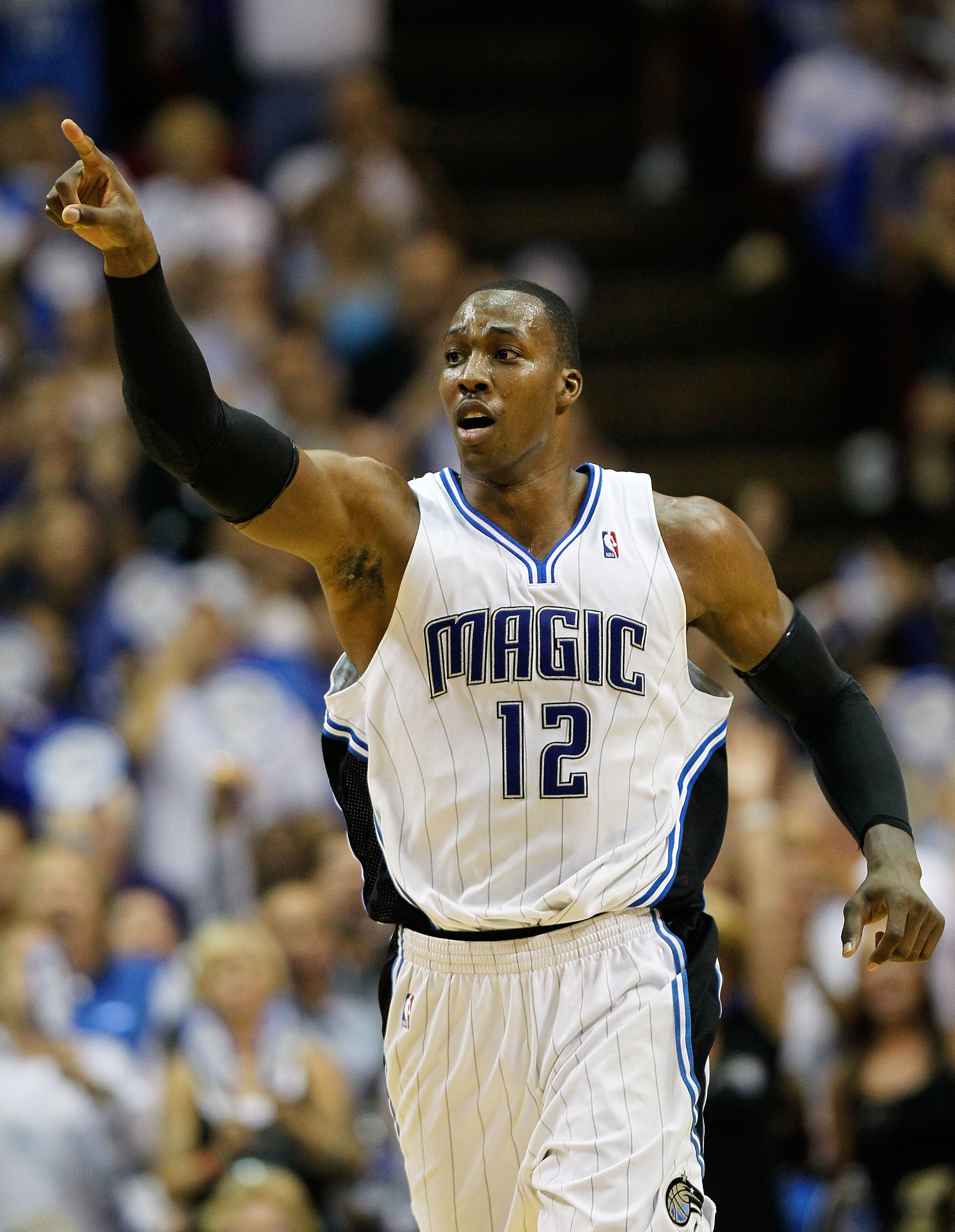 ORLANDO, FL - MAY 26:  Dwight Howard #12 of the Orlando Magic reacts against the Boston Celtics in Game Five of the Eastern Conference Finals during the 2010 NBA Playoffs at Amway Arena on May 26, 2010 in Orlando, Florida.  NOTE TO USER: User expressly ac