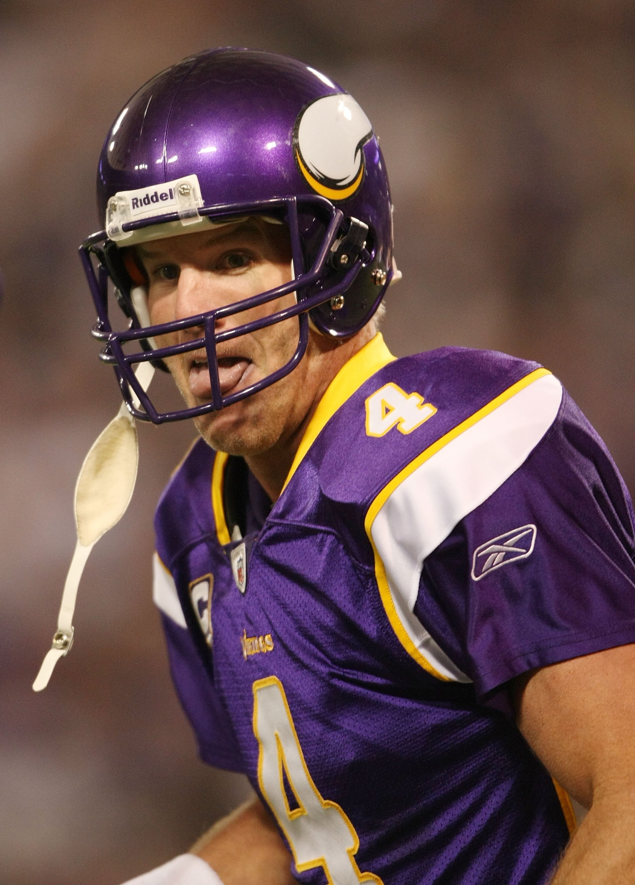 MINNEAPOLIS - NOVEMBER 15:  Brett Favre #4 of the Minnesota Vikings celebrates a touchdown in the fourth quarter against the Detroit Lions on November 15, 2009 at Hubert H. Humphrey Metrodome in Minneapolis, Minnesota. The Vikings defeated the Lions 27-10