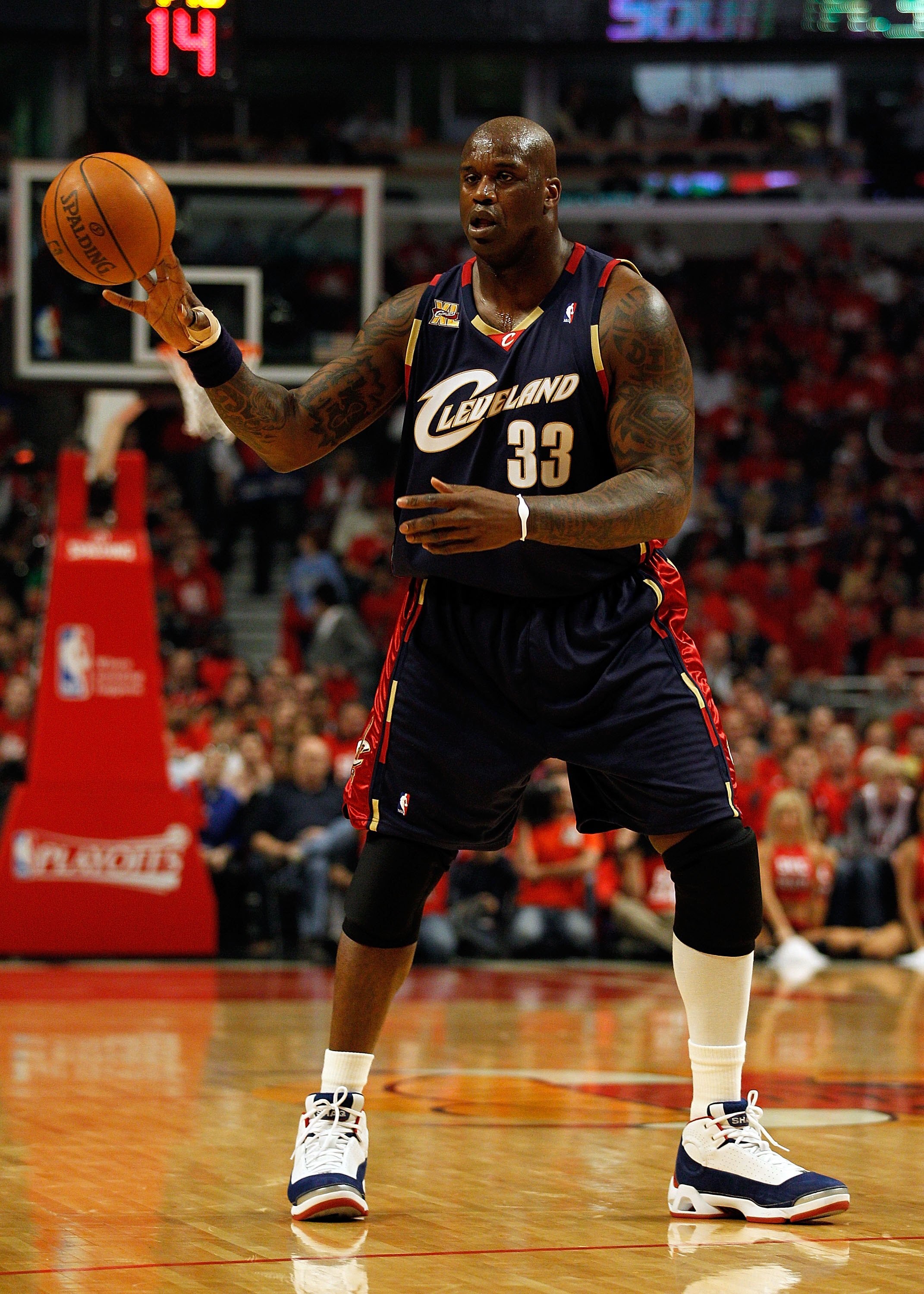 CHICAGO - APRIL 22: Shaquille O'Neal #33 of the Cleveland Cavaliers passes the ball against the Chicago Bulls in Game Three of the Eastern Conference Quarterfinals during the 2010 NBA Playoffs at the United Center on April 22, 2010 in Chicago, Illinois. T