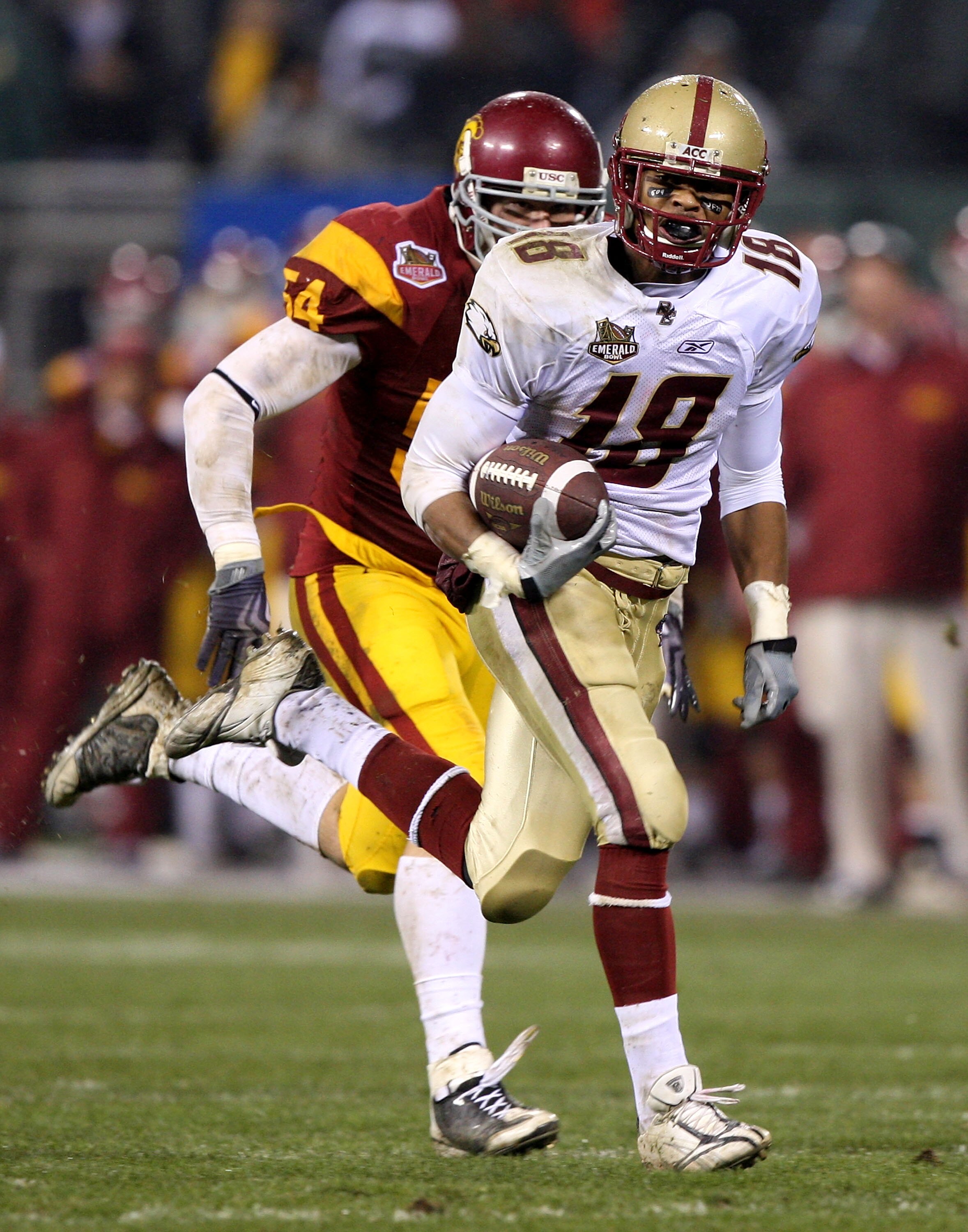 SAN FRANCISCO - DECEMBER 26: Rich Gunnell #18 of the Boston College Eagles runs for a touchdown after a catch against Chirs Galippo #54 of the USC Trojans during the 2009 Emerald Bowl at AT&T Park on December 26, 2009 in San Francisco, California. (Photo