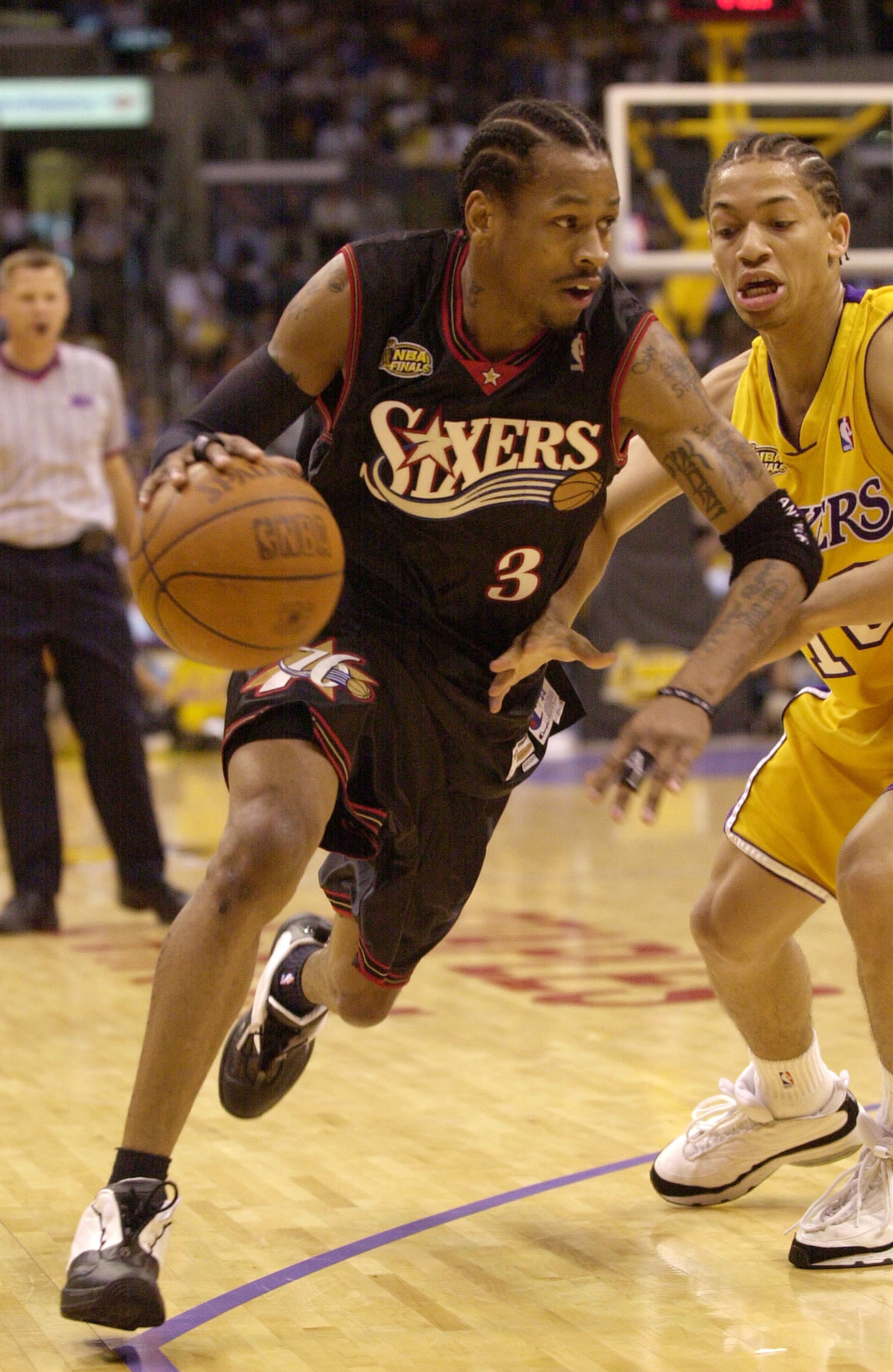 8 Jun 2001:  Allen Iverson #3 of the Philadelphia 76ers drives to the basket past Tyronn Lue #10 of the Los Angeles Lakers during Game 2 of the NBA Finals at the Staples Center in Los Angeles, California.  DIGITAL IMAGE Mandatory Credit: Otto Greule/ALLSP